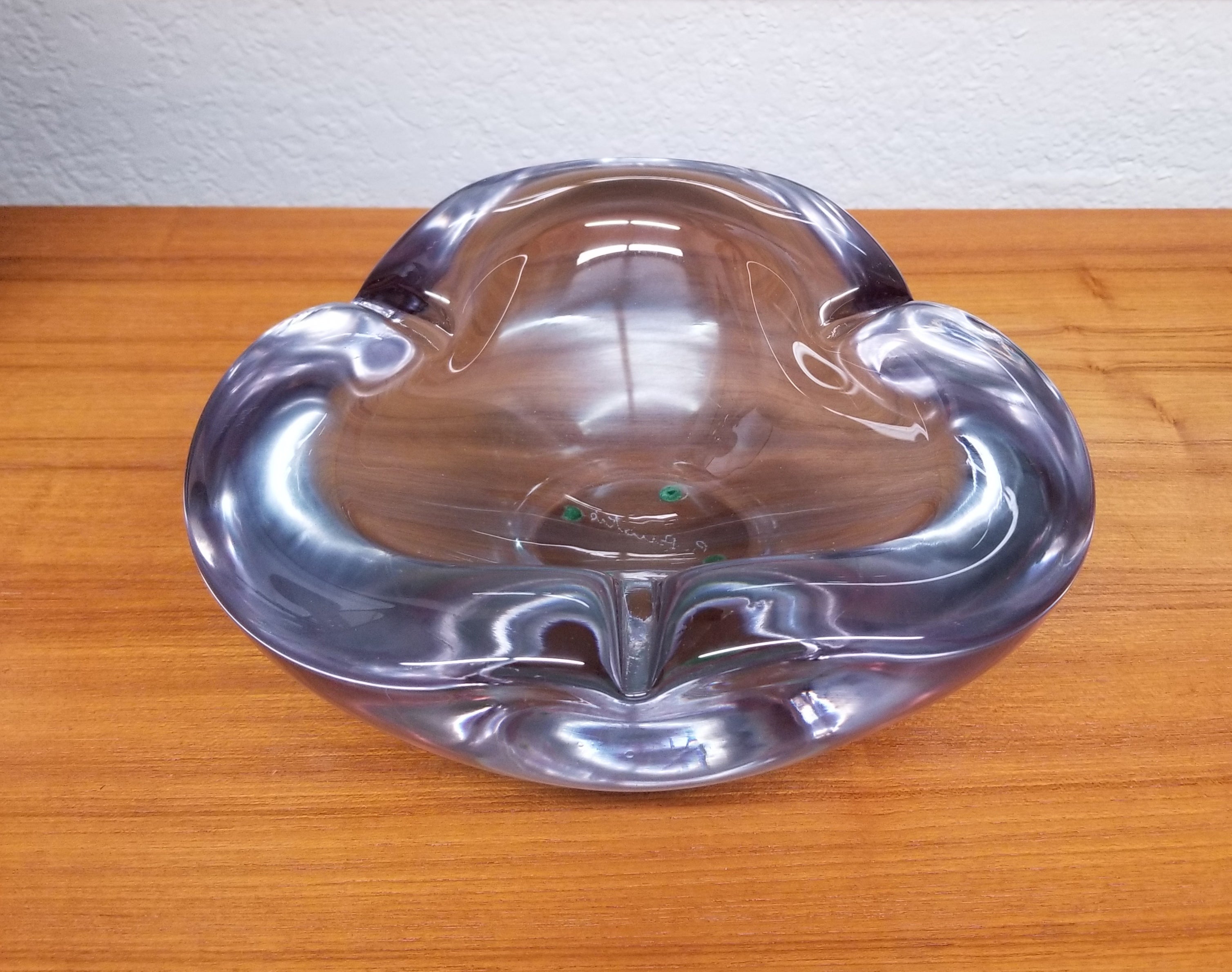 Incredibly gorgeous purple Italian art glass ashtray or catchall bowl, hand-made by Renato Anatrà in Murano, Italy. A hand-crafted statement piece with impressive weight and an amazing amethyst purple hue. Beautiful in its simplicity, striking jewel