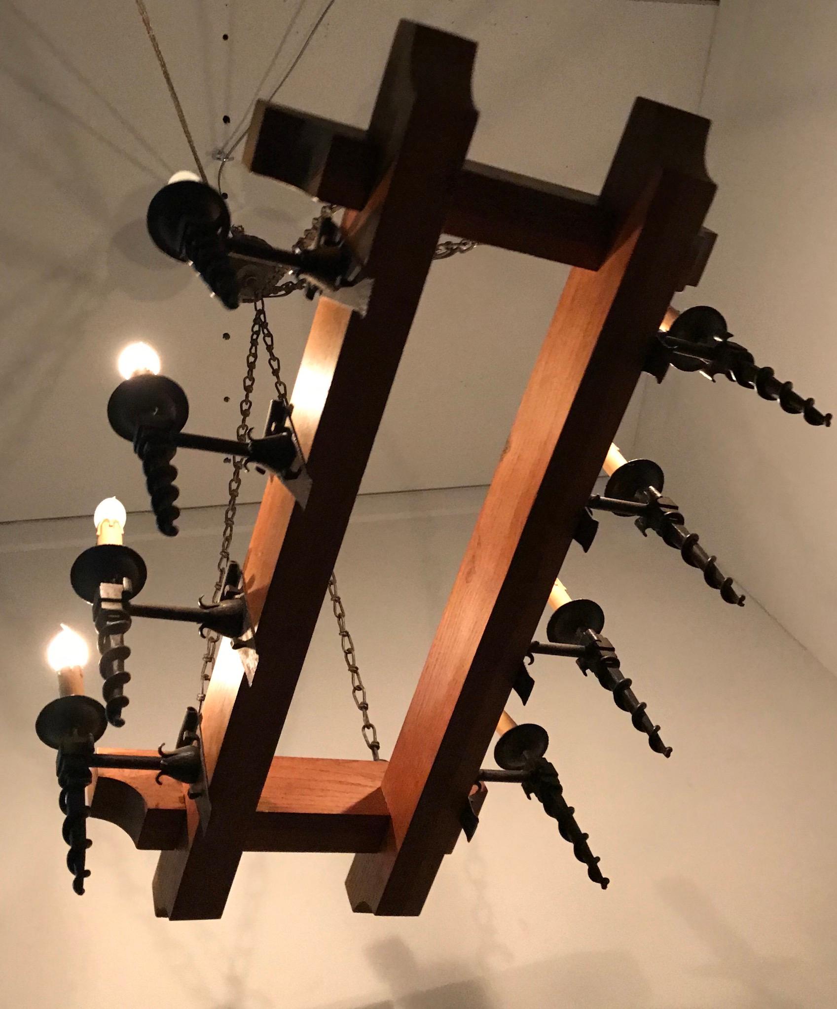20th Century Heavy Quality Oak Beams and Wrought Iron Torches Arts & Crafts Chandelier Light For Sale