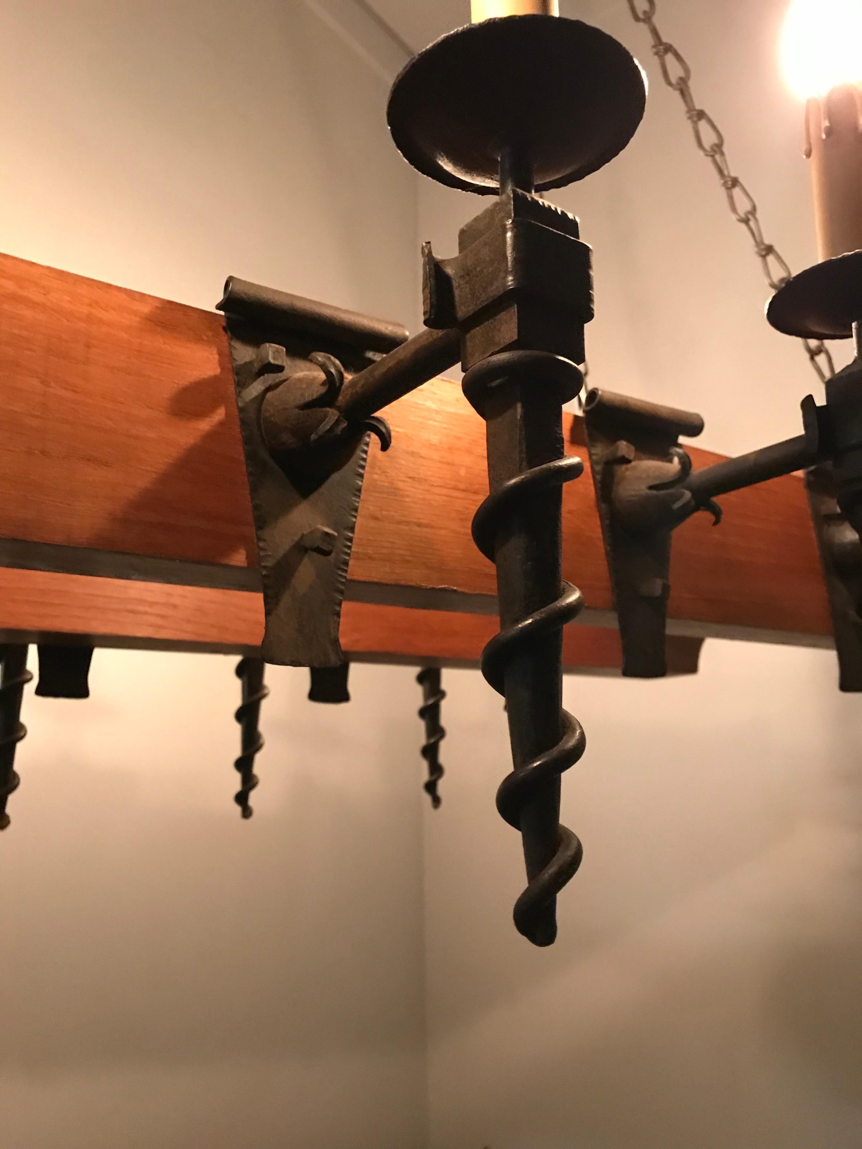 French Heavy Quality Oak Beams and Wrought Iron Torches Arts & Crafts Chandelier Light For Sale