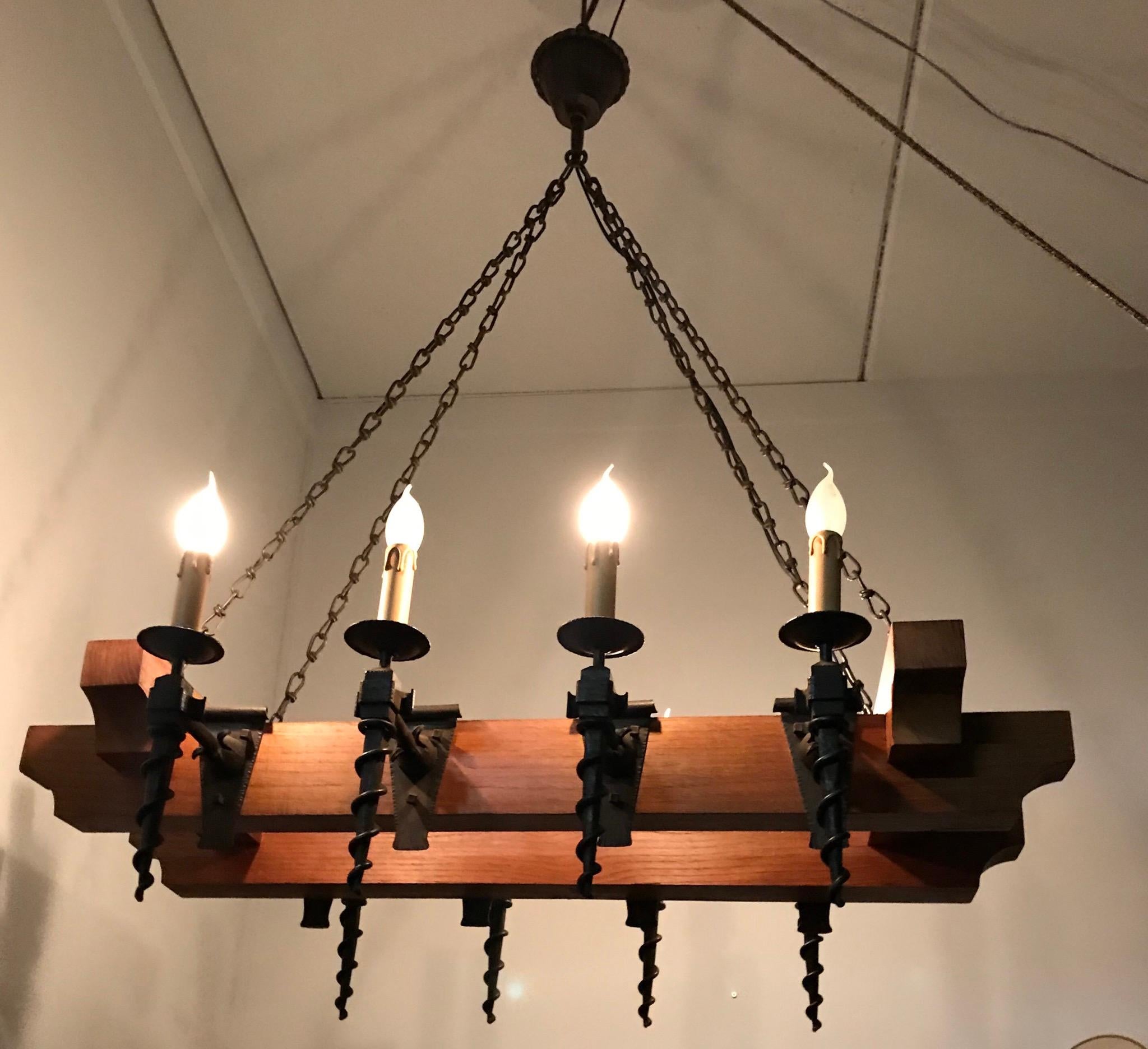 Forged Heavy Quality Oak Beams and Wrought Iron Torches Arts & Crafts Chandelier Light For Sale