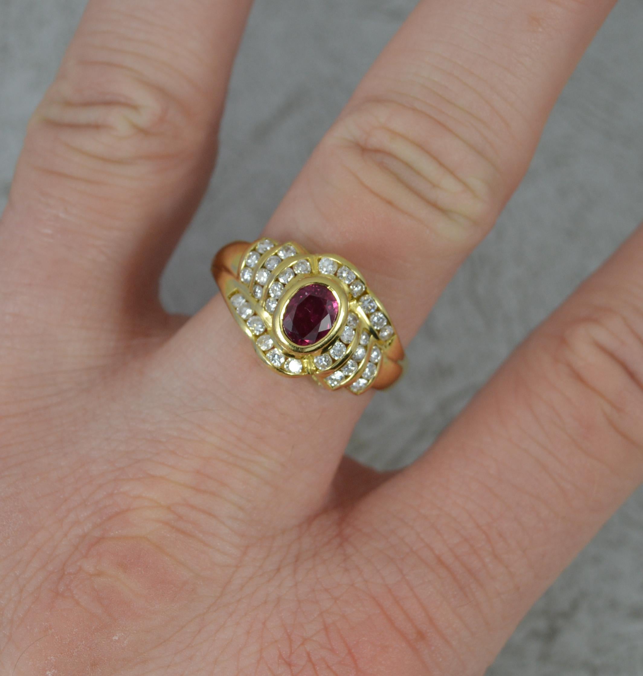 A beautiful Ruby and Diamond cluster ring.
Solid 18 carat yellow gold example.
Designed with an oval ruby to centre in full bezel setting, 4.7mm x 6.5mm. Surrounded are 34 round brilliant cut diamonds, vs clarity, e-f colour. 0.50 carats.
Superb