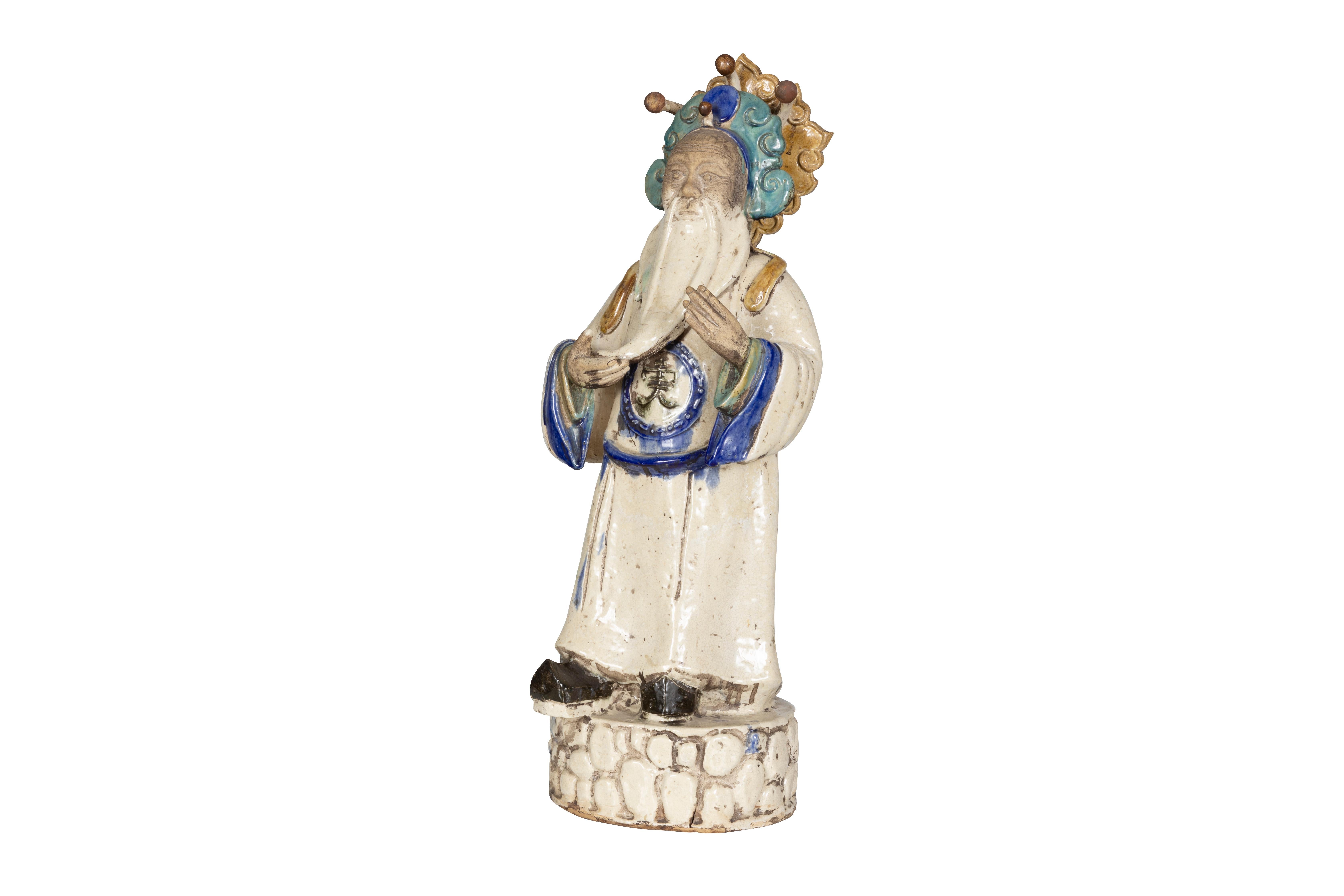 Gorgeous SanCai glazed terra-cotta wisdom figurine, Crafted in the Tang Dynasty Style. The clay is coated or made into clay sheets, then placed inside the model, and pressed into form then sculpted. 

This piece is a part of our one-of-a-kind