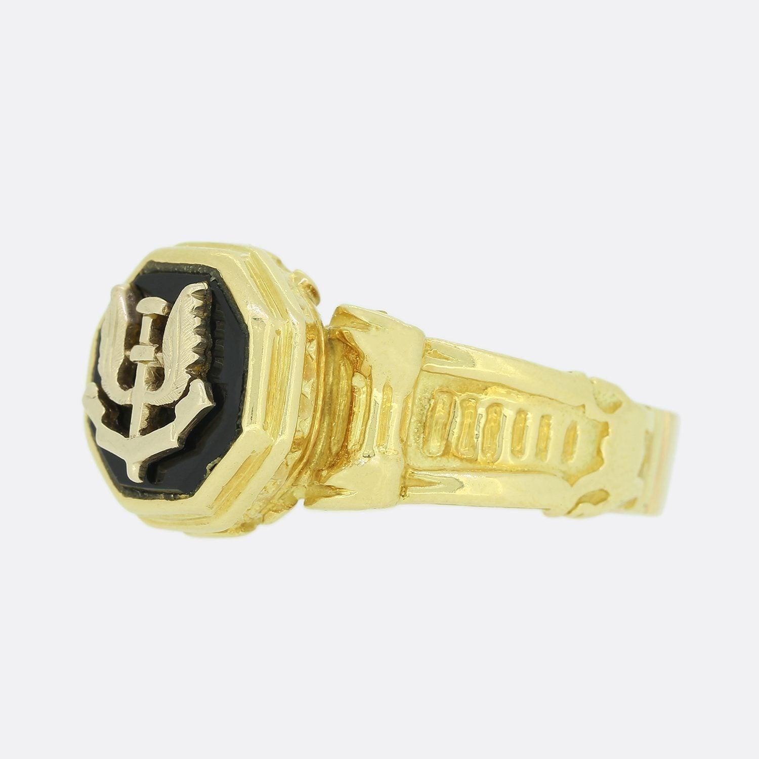 This is a modern 18ct yellow gold heavy gents SAS ring. The face of the ring features the SAS symbol with a border of onyx and has been crafted in 18ct yellow gold. 

The Special Air Service (SAS) is a world renowned special forces unit of the