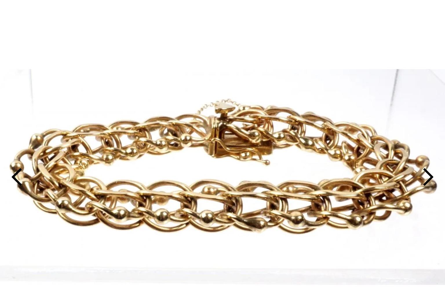 heavy gold charm bracelet