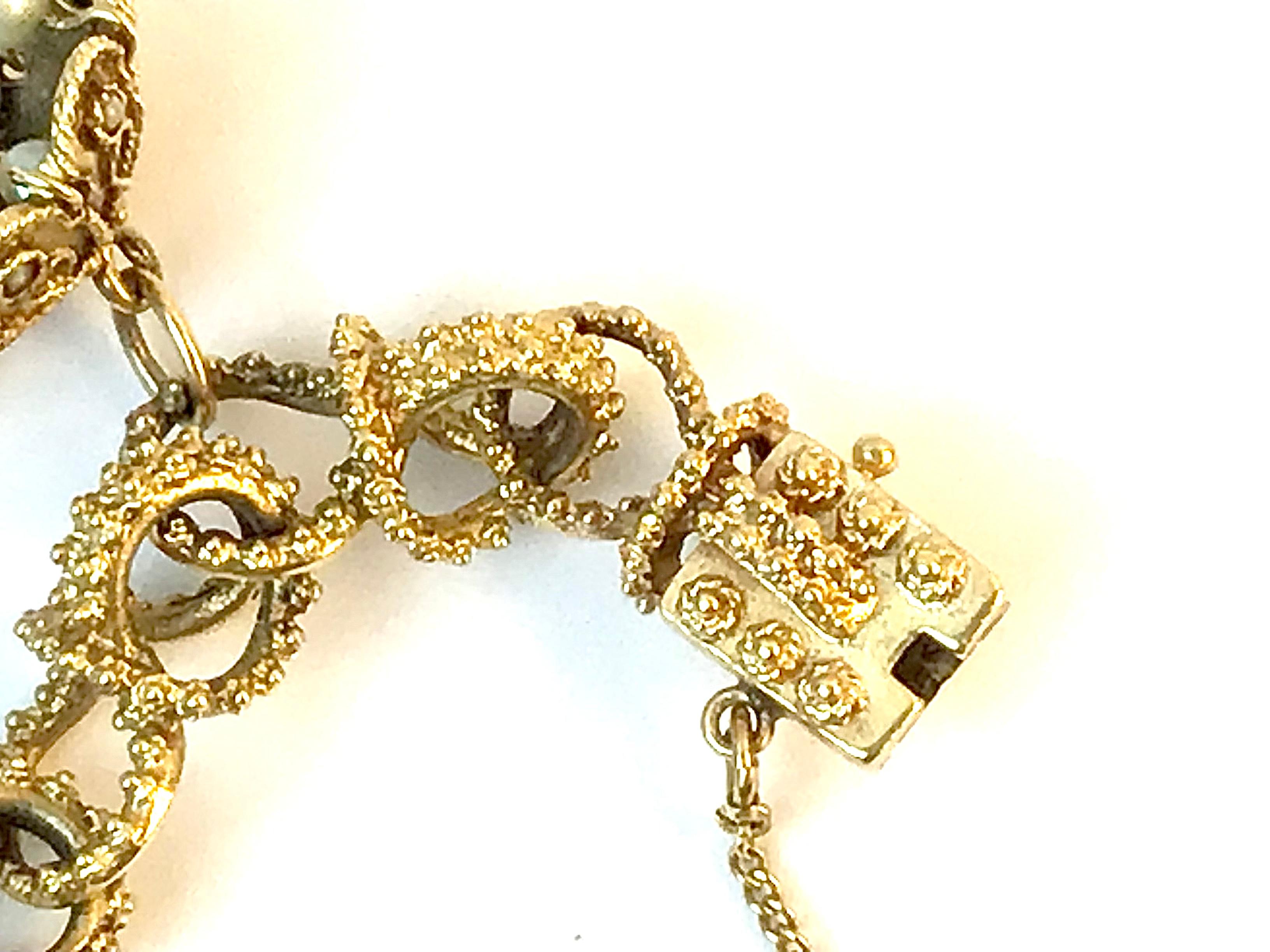 Moderne Bracelet à breloques en or massif 14 carats lourd avec breloques en vente