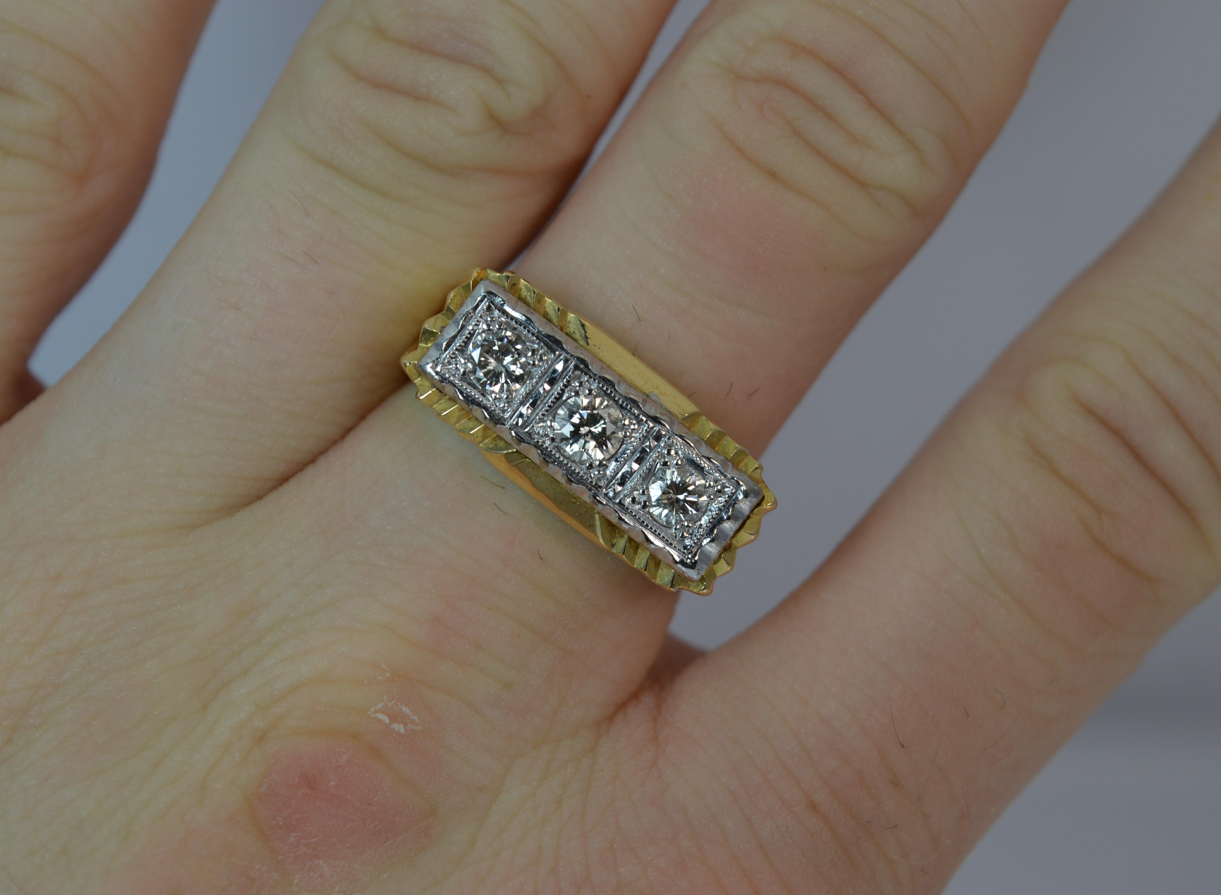 
An 18ct Gold and Diamond three stone ring.

Designed with three round brilliant cut diamonds to total 0.50 carats approx.

Clean and sparkly diamonds set in white gold.

21mm x 10mm head. 



CONDITION ; Excellent. Clean and strong band. Securely
