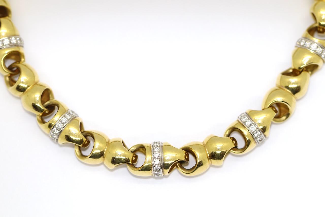 Beautiful, elegant and Heavy, Solid Chain Link Designer Necklace, 18 Karat Gold with Diamonds.

Including certificate of authenticity.