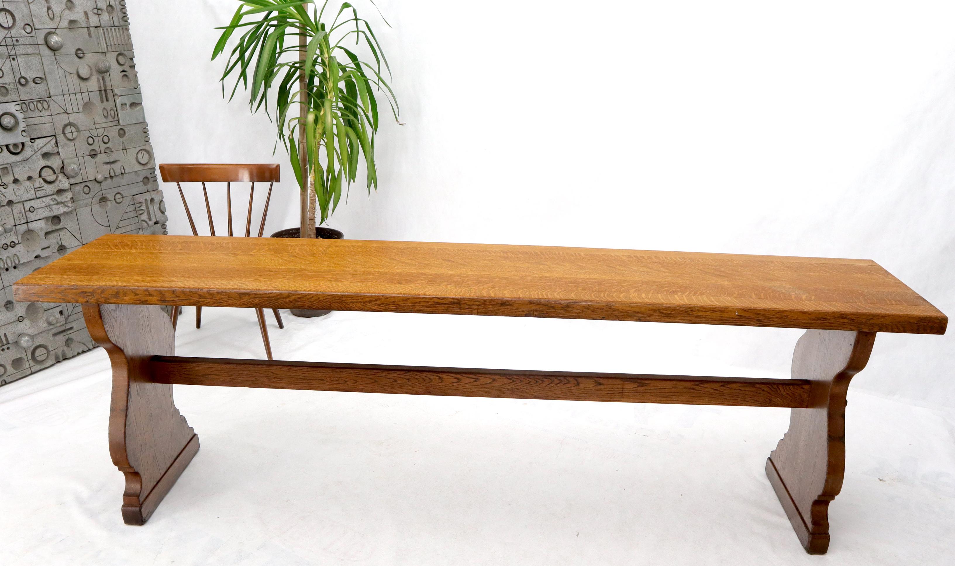Long and narrow solid oak top harvest console dining farm table.
