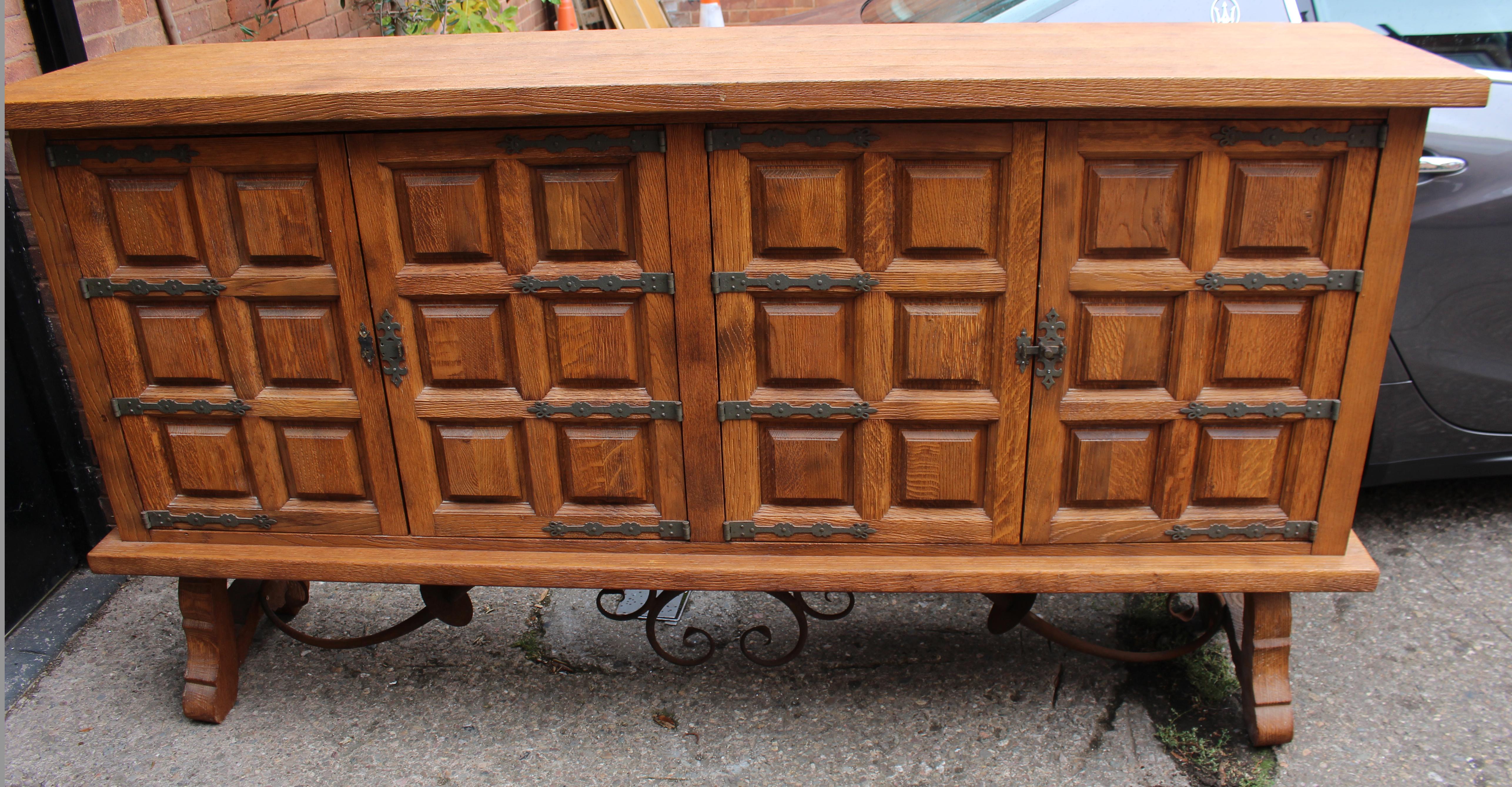 Heavy Spanish Oak Side Cabinet with Geometric Panel Doors In Fair Condition For Sale In Worcester, GB