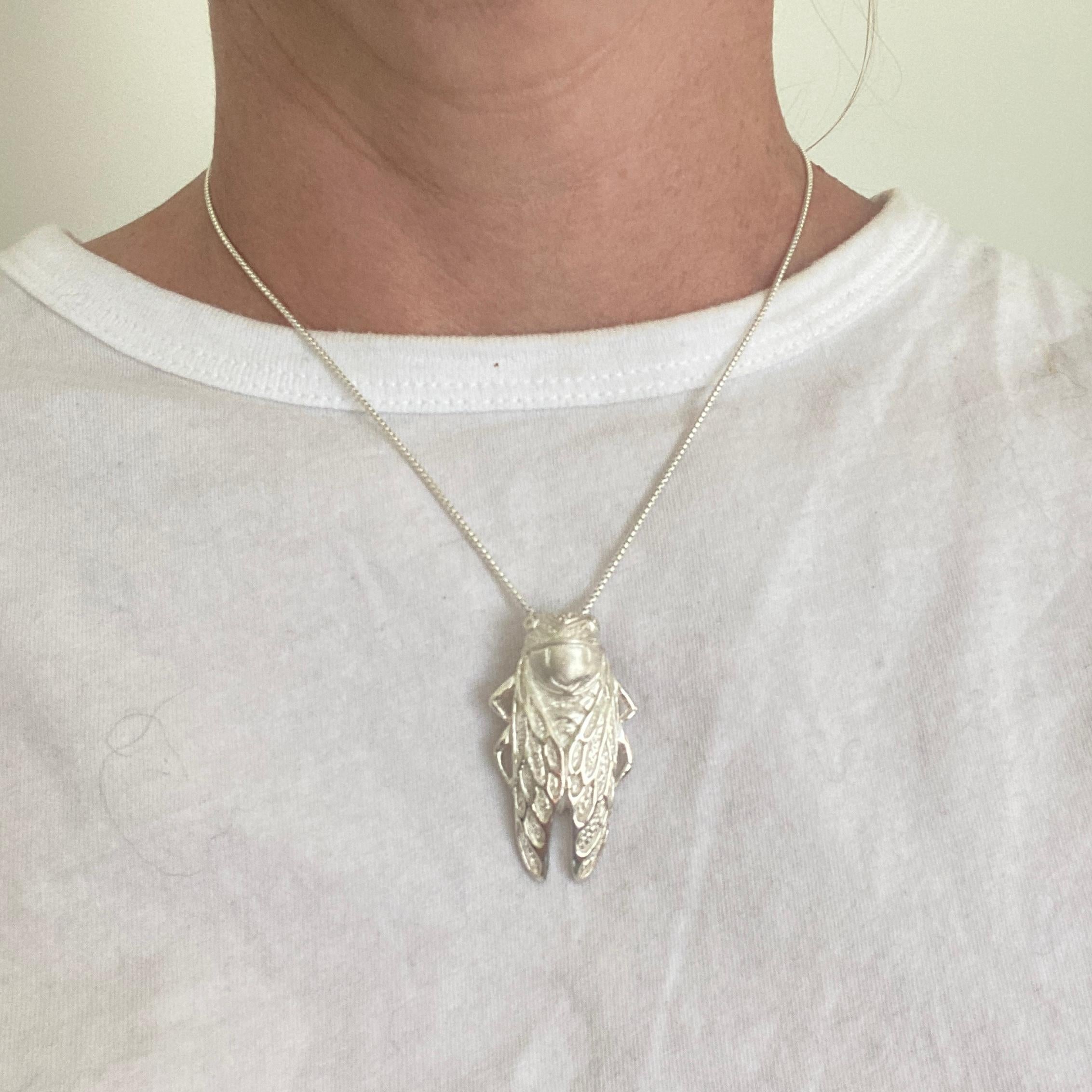 Heavy Sterling Silver Detailed Cicada Pendant with Diamond Eyes by Ashley Childs

Cicada originally carved by 