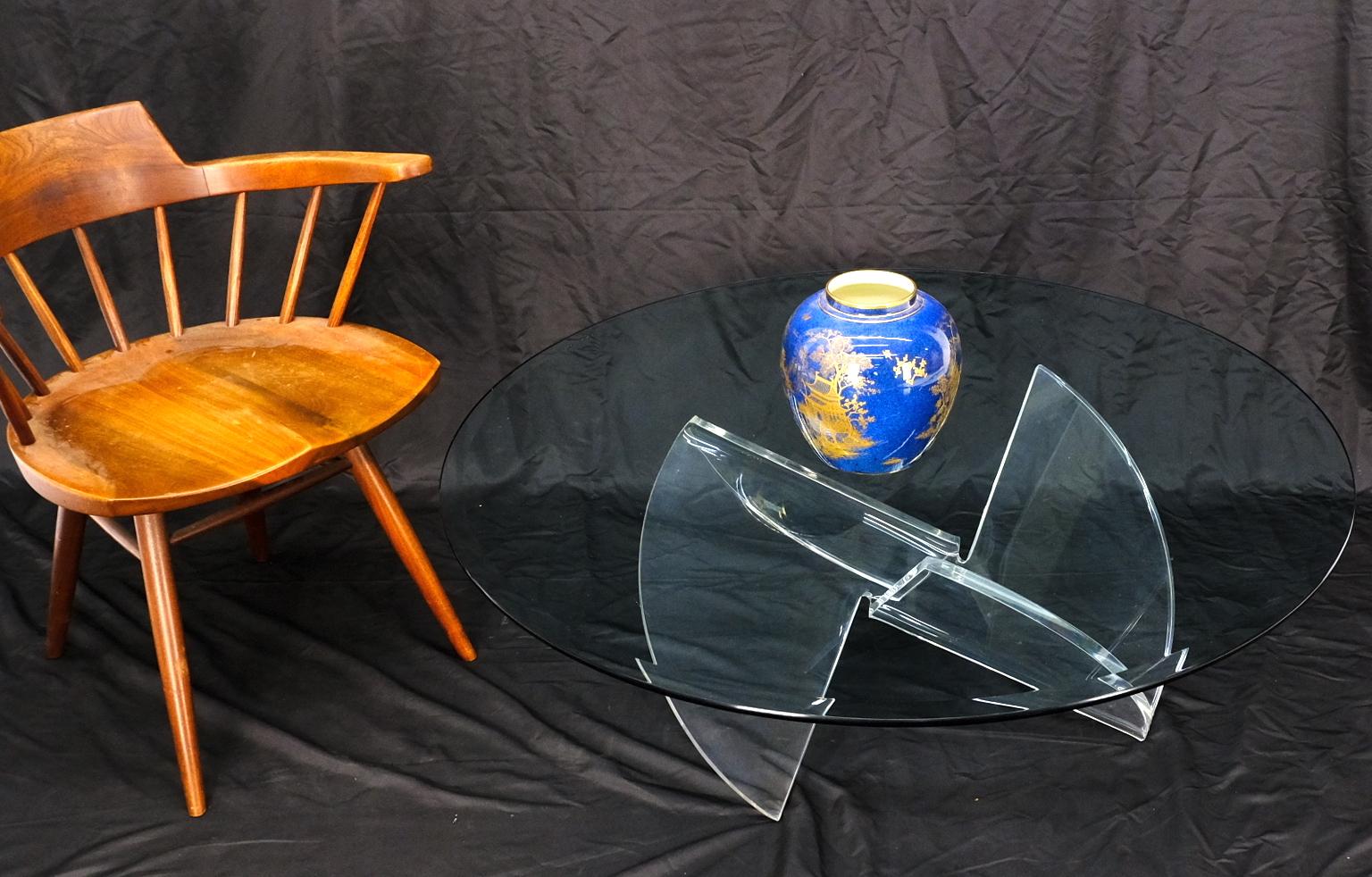Mid-Century Modern heavy bent and polished lucite glass top coffee table.
