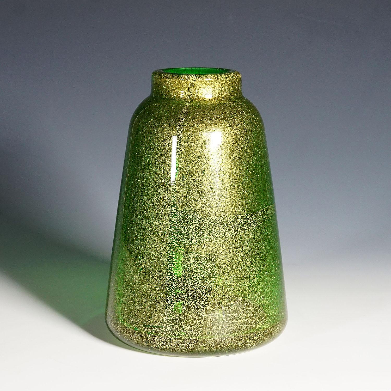 Heavy Vetro Sommerso Vase by Carlo Scarpa for Venini Murano ca. 1930s

A vetro sommerso bollicine vase designed by Carlo Scarpa between 1934 and 1936. Manufactured by Venini Murano Venice in the 1930s. Thick green glass with multiple air bubbles and