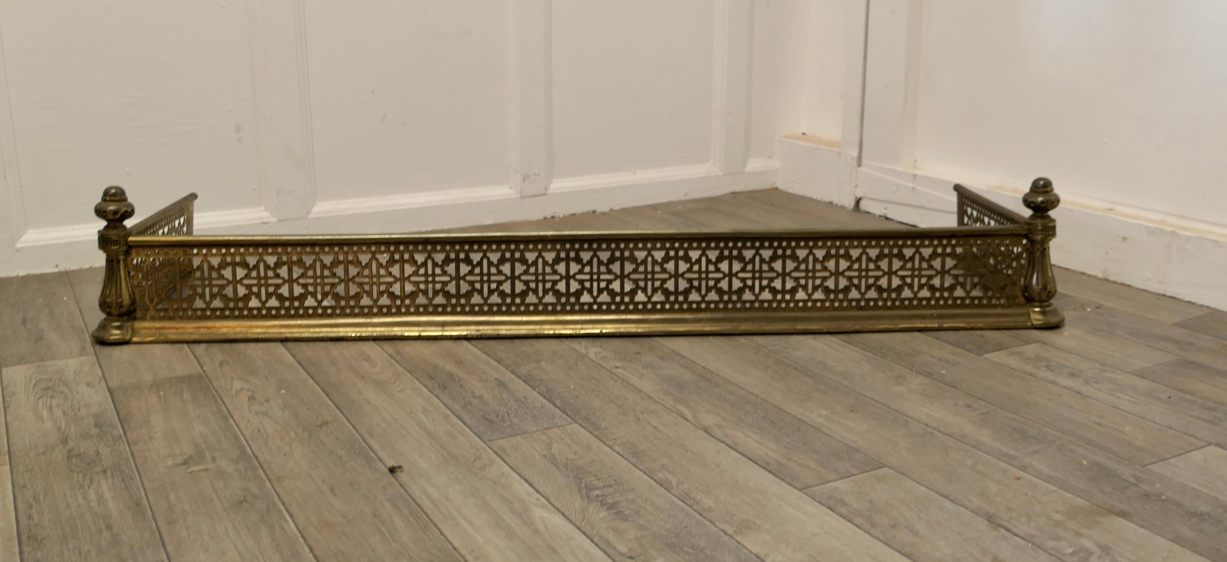Heavy Victorian arts and crafts pierced brass fender 

This is a very superior quality Victorian Pierced Brass Fender it has a lattice piercing along the front and sides 
The Fender is in Very Good Condition, it is 8” high, and 47” long and 14”
