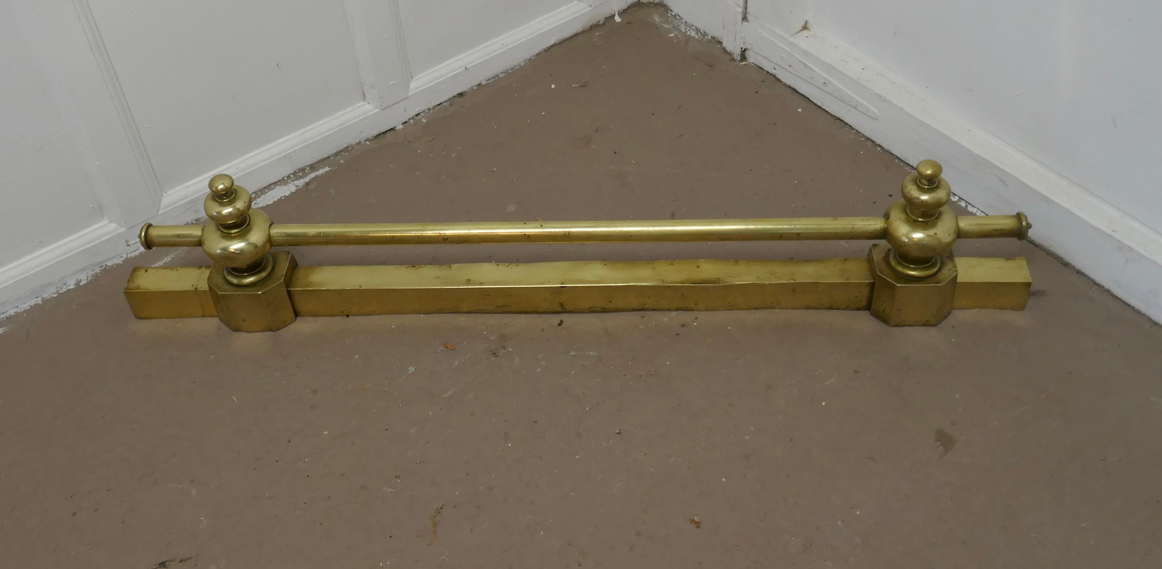 Heavy Victorian brass rail fender tool rest


This is a Victorian Classic brass fender it has superb a heavy brass rod, set on chunky brass balusters, to keep all the fire tools ready for use
The fender is in good antique condition it is 10”