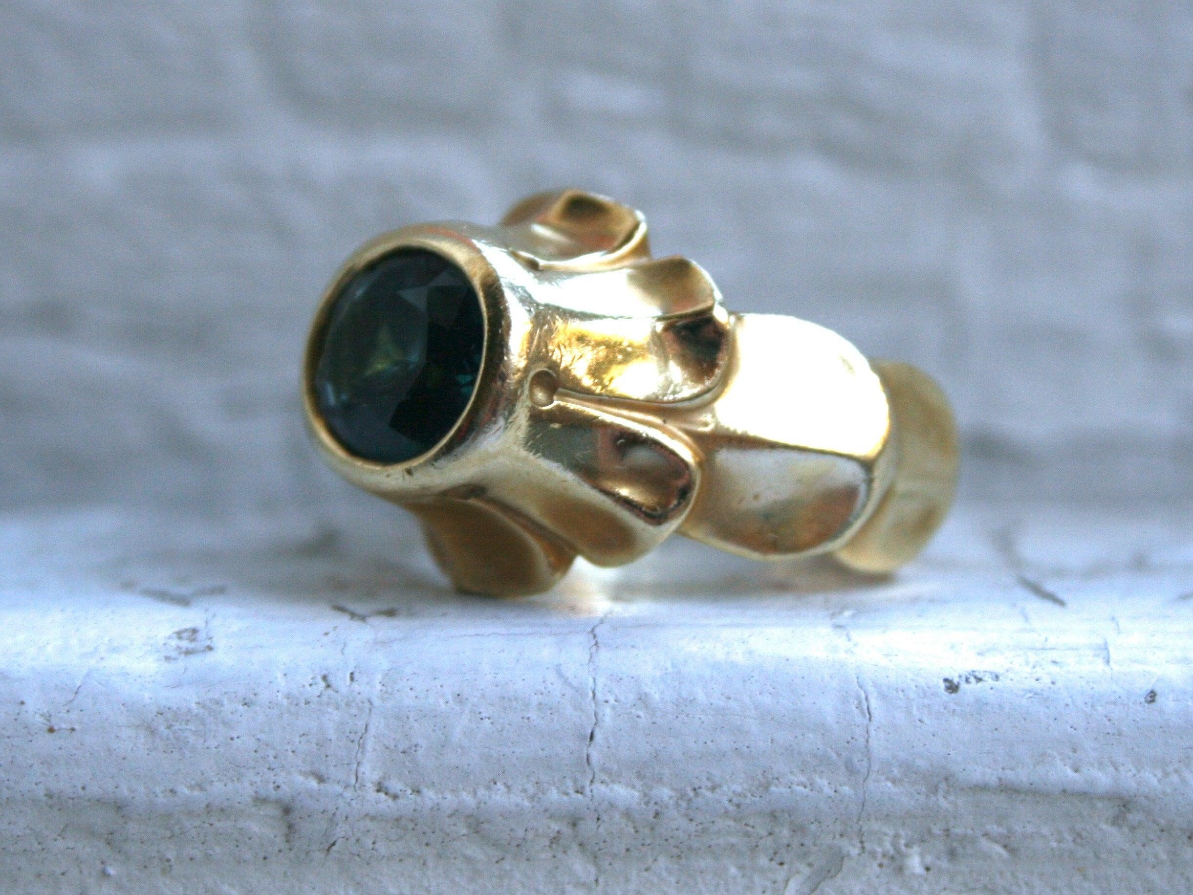 Wow!! This Fantastic Vintage Green Tourmaline Ring by Elizabeth Rand truly is a special piece! Crafted in 18K Yellow Gold, the design is a totally unique, hand carved, one of a kind piece by jewelry design Elizabeth Rand, with a gorgeous bezel set