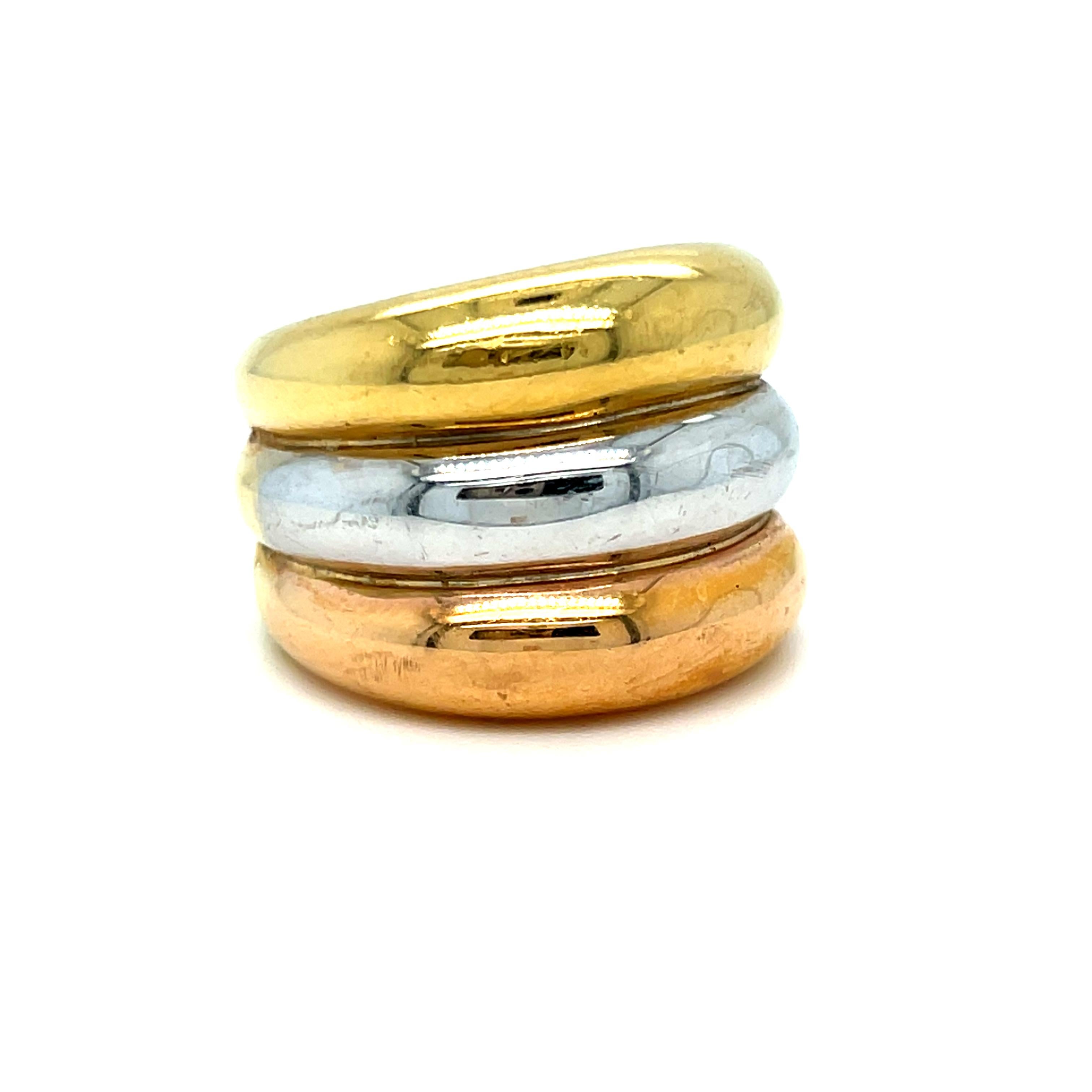Who doesn't love an awesome wide band?!? Crafted in 18K Gold, the band features three rows 