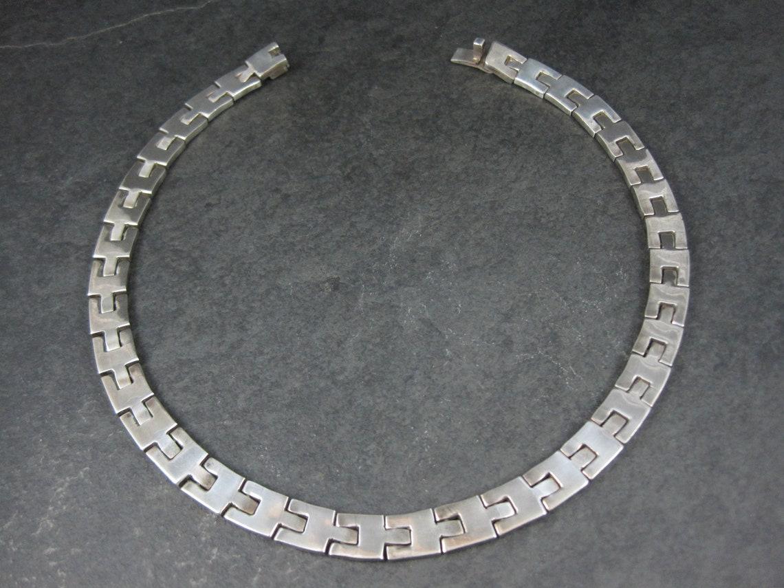 The necklace is 11mm thick.
It measures apx 16 inches from end to end.
Hallmarks include: Mexico, TR-111, JRD
It weighs 107.4 Grams.
The box clasp is in great working order.

Overall this necklace is in excellent condition.