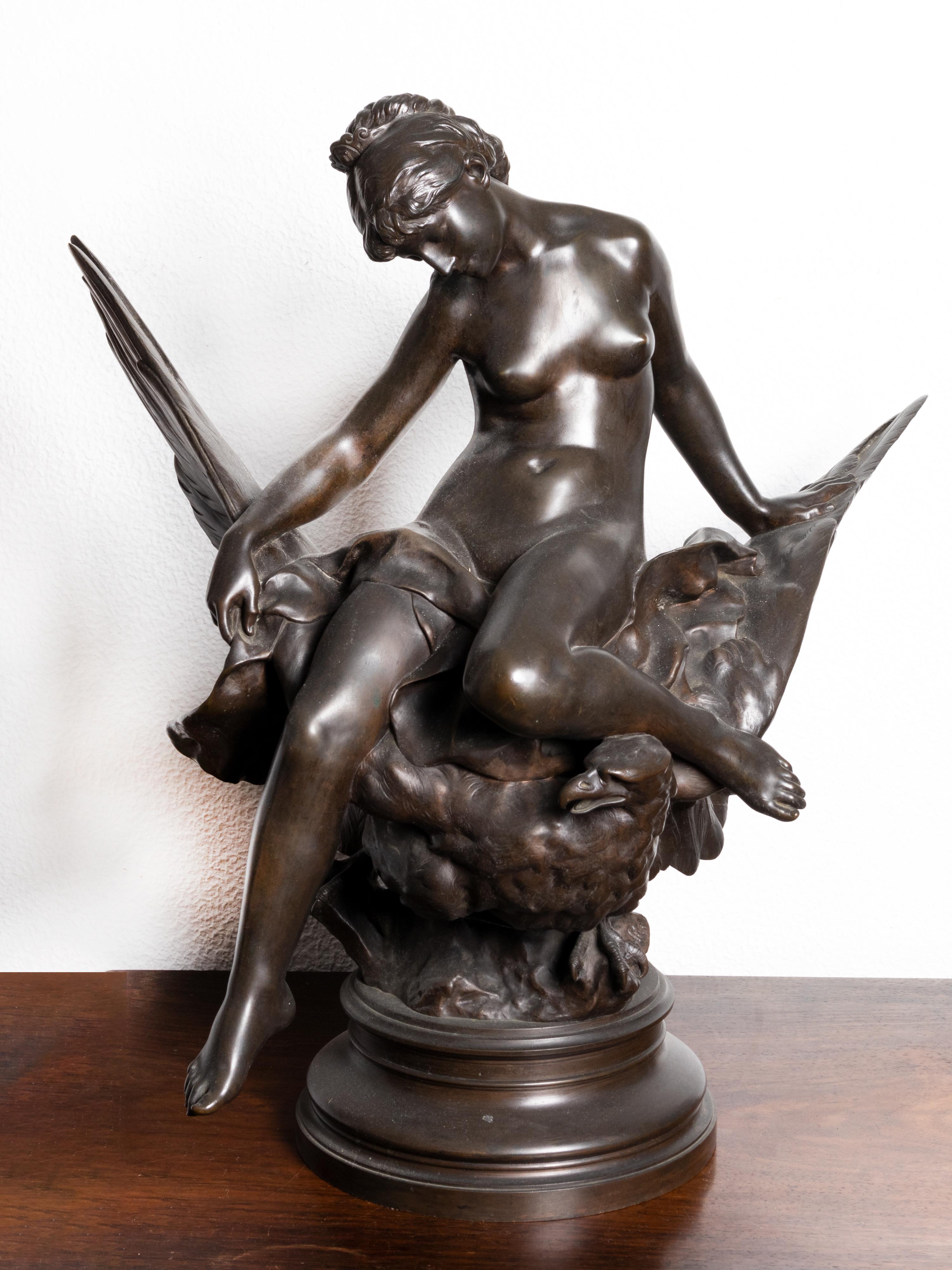 A ‘Hebe and the eagle of Jupiter’ statue by the artist Jules Pierre Roulleau. Statue depicting the Greek goddess of youth, Hebe, the cupbearer to the gods. 
Hebe raises a vessel of the divine beverage ambrosia above her father, Zeus, in the guise of