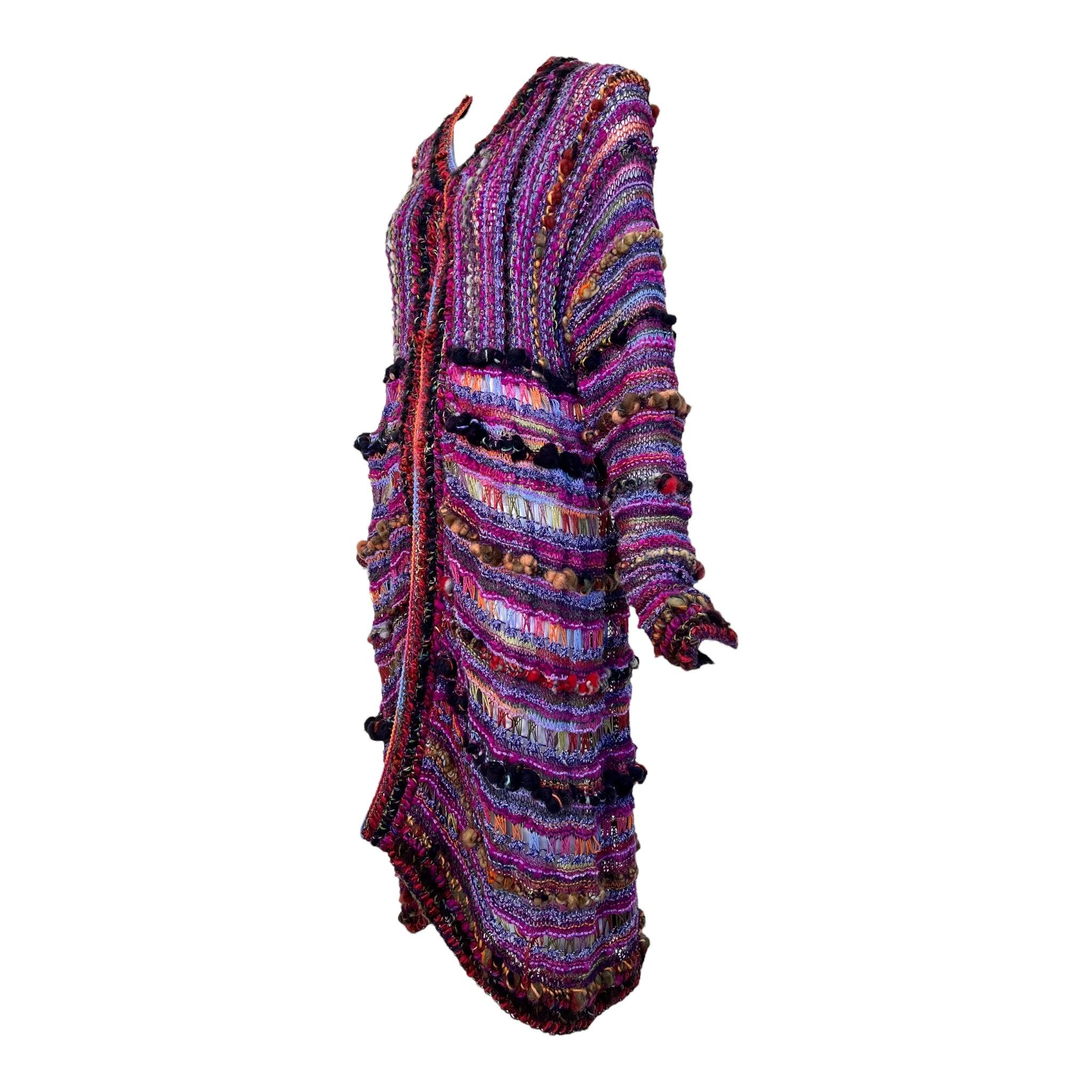 Indulge in the luxurious Chilean handcrafted cardigan sweater with a fitting label, 