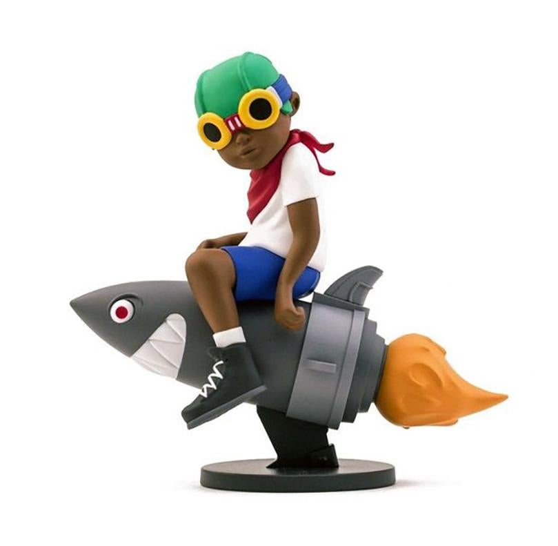Hebru Brantley Flyboy, 2018. New in its original packaging.

Medium: Painted cast vinyl. 
Dimensions: 9 x 8 x 4 inches (22.9 x 20.3 x 10.2 cm). 
New, never displayed; accompanied by original packaging.
From a sold out edition of unknown; published