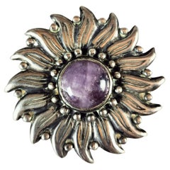 Spilla Héctor Aguilar Girasole in argento 0,940 e quarzo ametista