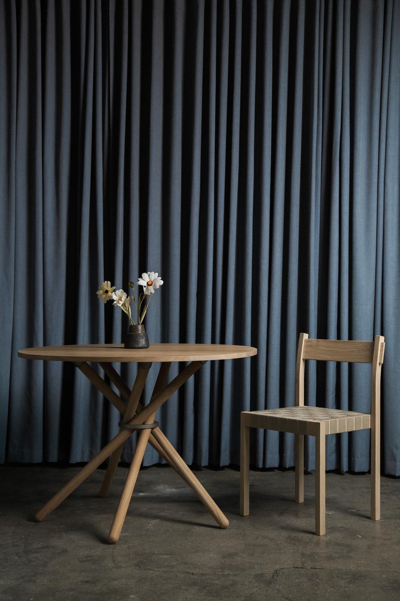 Hector Light Oak Dining Table 105 by Eberhart Furniture
Dimensions: D 105 x H 73 cm.
Materials: Light oak, metal.

Available in other finishes.
Available in 105, 120, or 140 cm. Please contact us.

Hector 105 – a dining table designed to be the