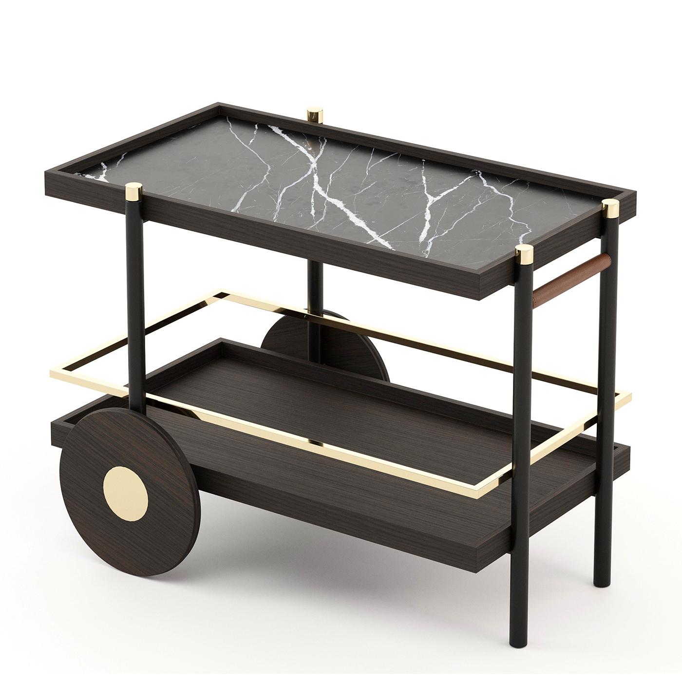 Trolley Hector with wooden structure in smocked.
Oak matte finish, with polished stainless steel in gold.
Finish and with 1 handle covered with brown leather.
Upper top in black marble and bottom top in wood
In smocked oak matte finish.
Also