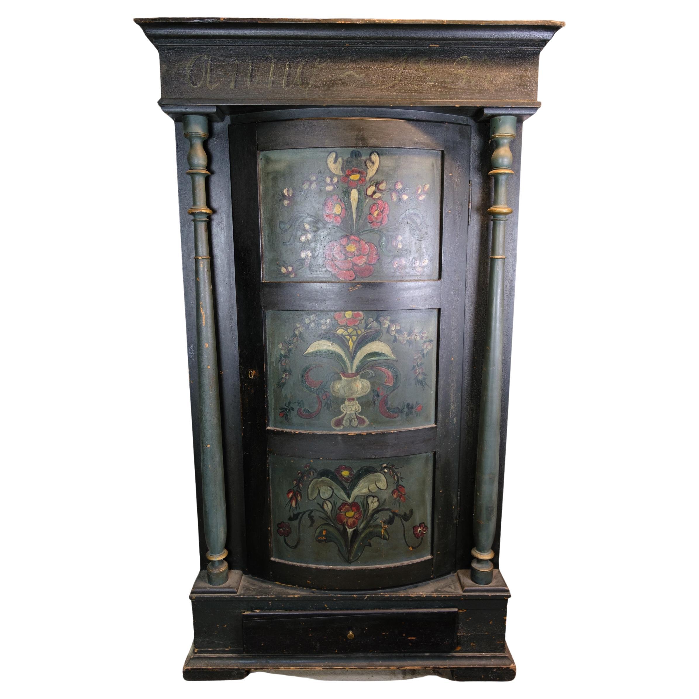 Columnas de gabinete verde oscuro con decoración de flores de 1836