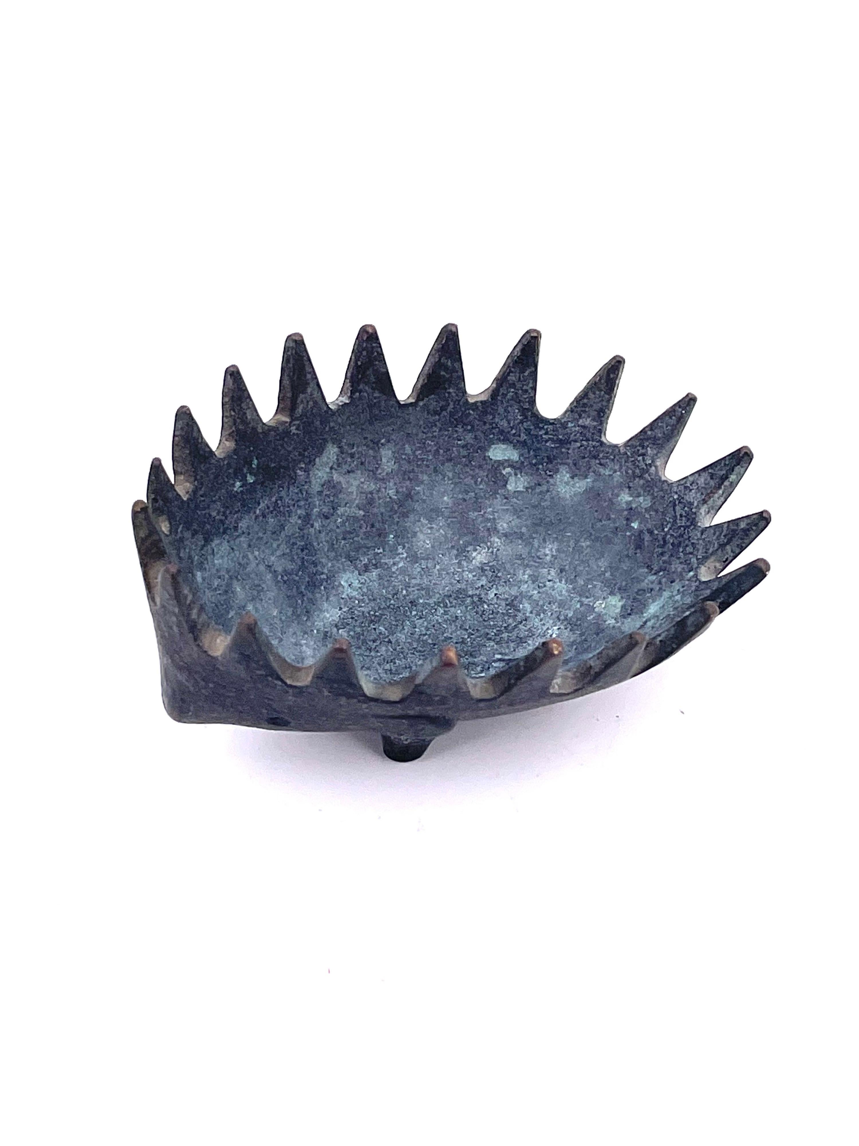 Cool solid patinated brass hedgehog sculpture can be used as an ashtray or ring catcher for jewelry, its in original condition.