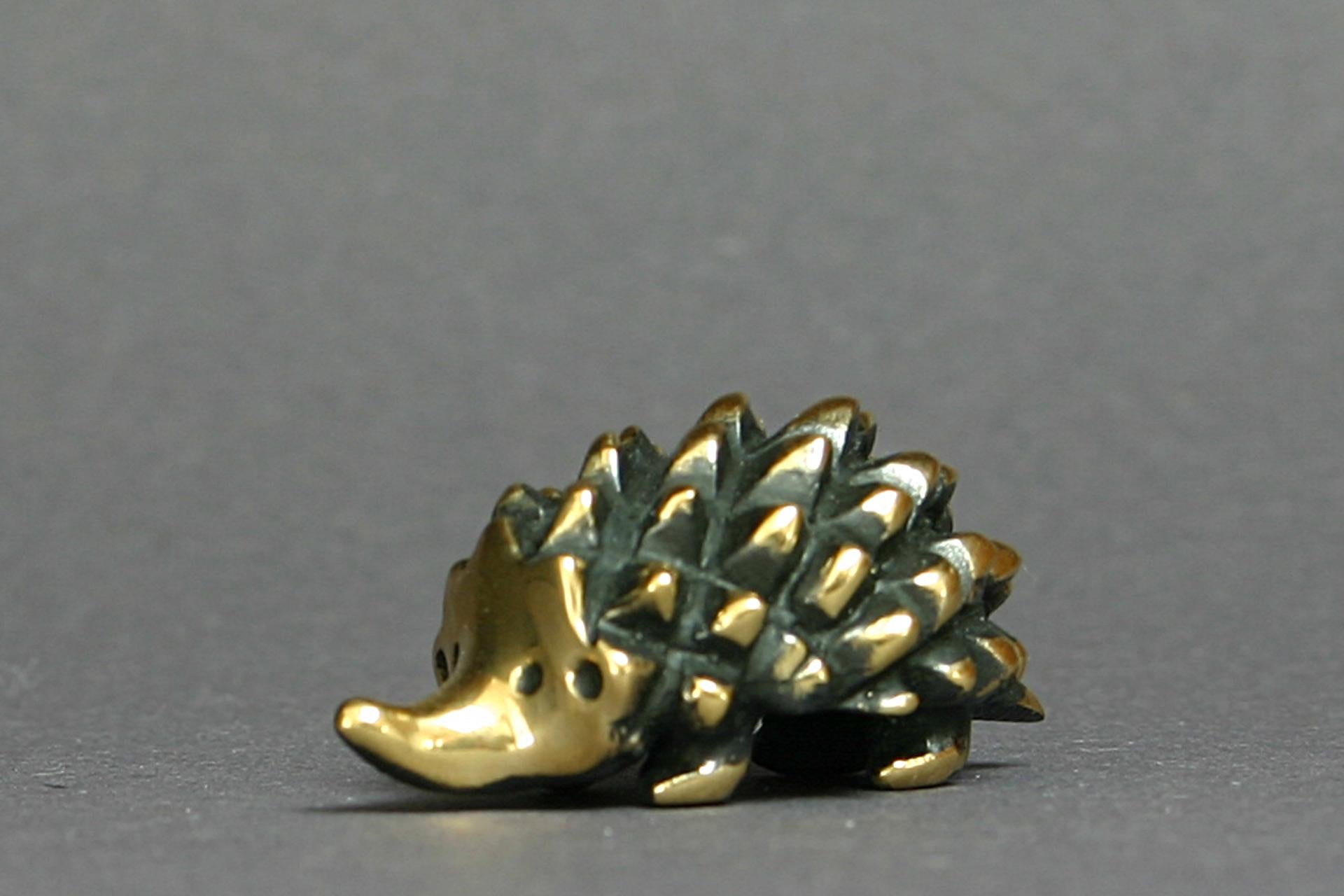 This hedgehog figurine was produced in Austria and is signed at the bottom: Bosse Austria. The piece comes together with a fabric pouch, including a certificate, too. 
Model N° BO 5433

In 2000 a Viennese public house released the first monograph