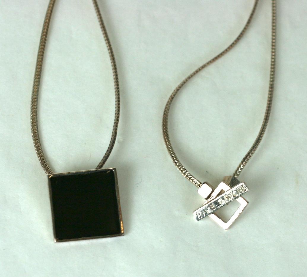 Yves Saint Laurent mens/unisex pendant necklace by Hedi Slimane, Rive Gauche 2003 . Composed of flat chain with focal black enamel square pendant, and logo toggle clasp. 
Excellent Condition 
Length 16
