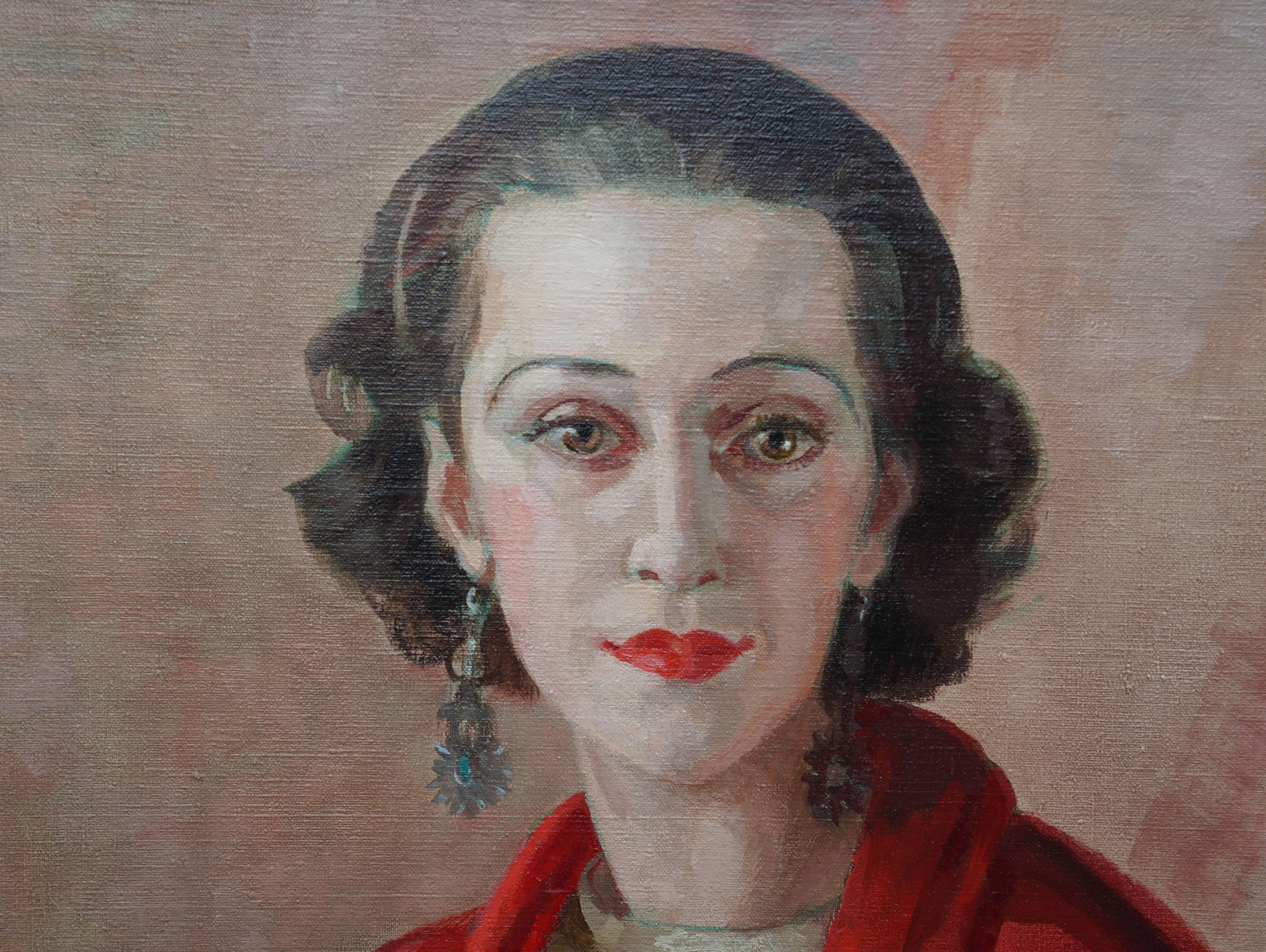 Questo raffinato ritratto britannico a olio è opera dell'artista femminile Hedwig Pillitz ed è stato dipinto intorno al 1930. I suoi genitori emigrarono dall'Ungheria in Inghilterra e Hedwig e la sorella attrice Doris crebbero a Londra. Pillitz era