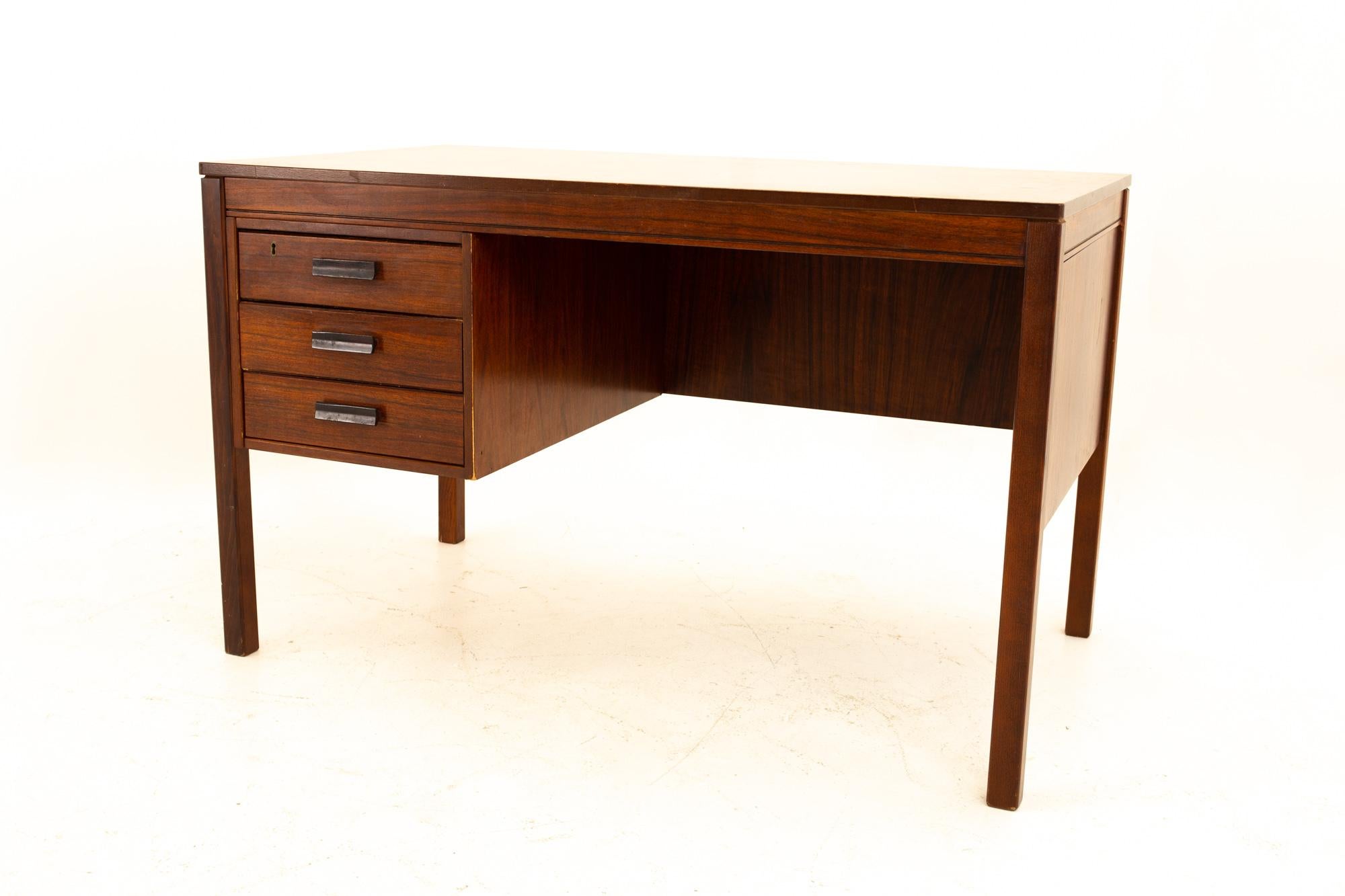 Heggen of Norway mid century rosewood desk
Desk measures: 47.5 wide x 28 deep x 29 high

All pieces of furniture can be had in what we call restored vintage condition. That means the piece is restored upon purchase so it’s free of watermarks,