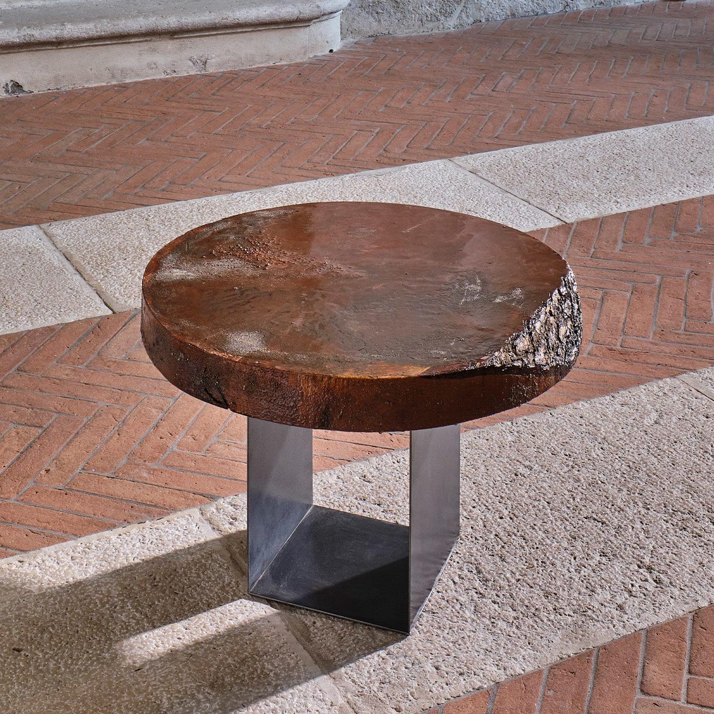 This magnificent coffee table features a sculptural shape comprised of an irregular top derived from a section of paulownia solid wood, and a sculptural iron base. Painted by hand with resin and acrylics. All products offered are handcrafted one at