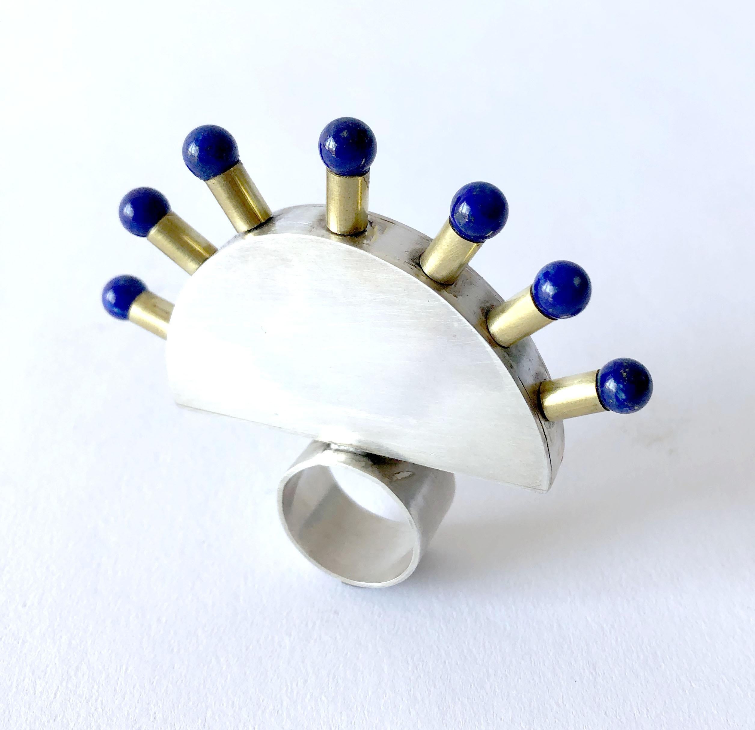 Large scale sterling silver and brass ring accented with seven lapis lazuli spheres.  Entitled 