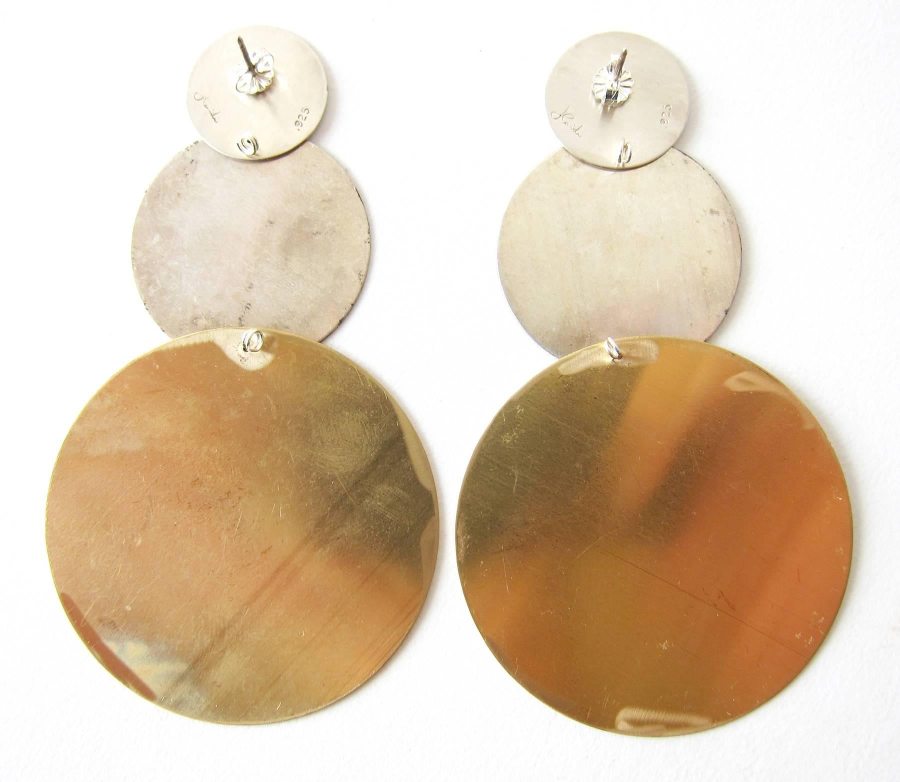 Oxidized sterling silver and brushed brass kinetic modernist earrings created by Heidi Abrahamson of Phoenix, Arizona.  Pierced earrings measure 3.5
