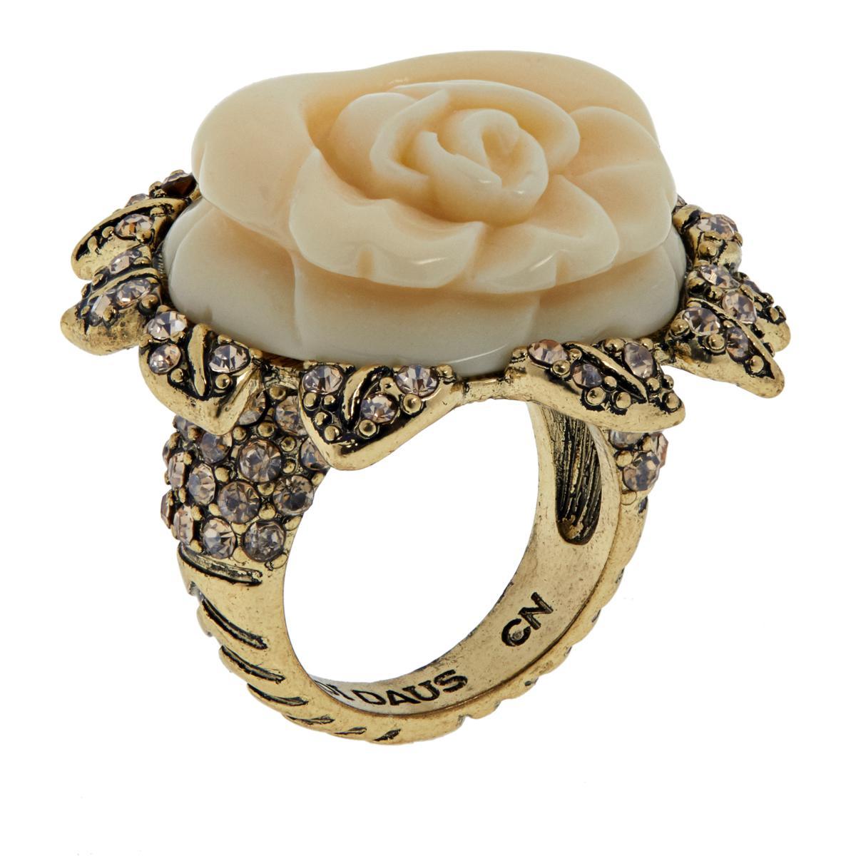 Heidi Daus Premier Rose Crystal Accented Ring SZ 12

Your new favorite statement floral? Looks a lot like the wondrous rose blossoming on this twinkling ring.

Design Information
Carved, ivory-color resin rose forms table
Petal-designed frame with