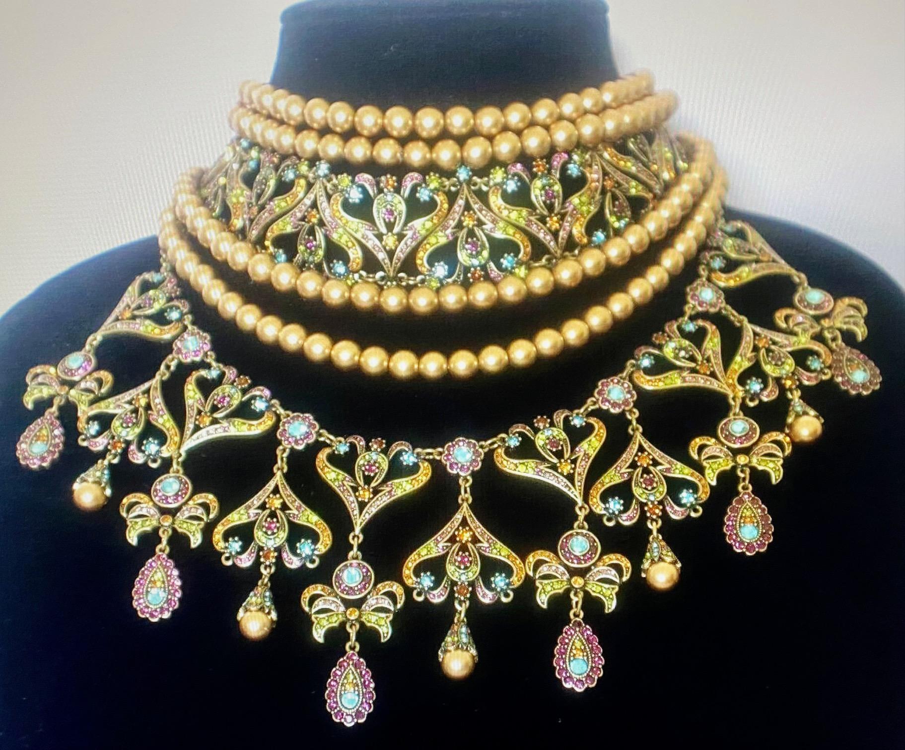 Heidi Daus Seductive Fantasy Gold Choker Dangle Beaded Necklace & Earring Set Clip Ons SWAROVSKI RARE PC

Simply Breathtaking!!!
The necklace is ridiculously gorgeous!
Easily the most beautiful necklace I've ever seen.
It's all a matter of