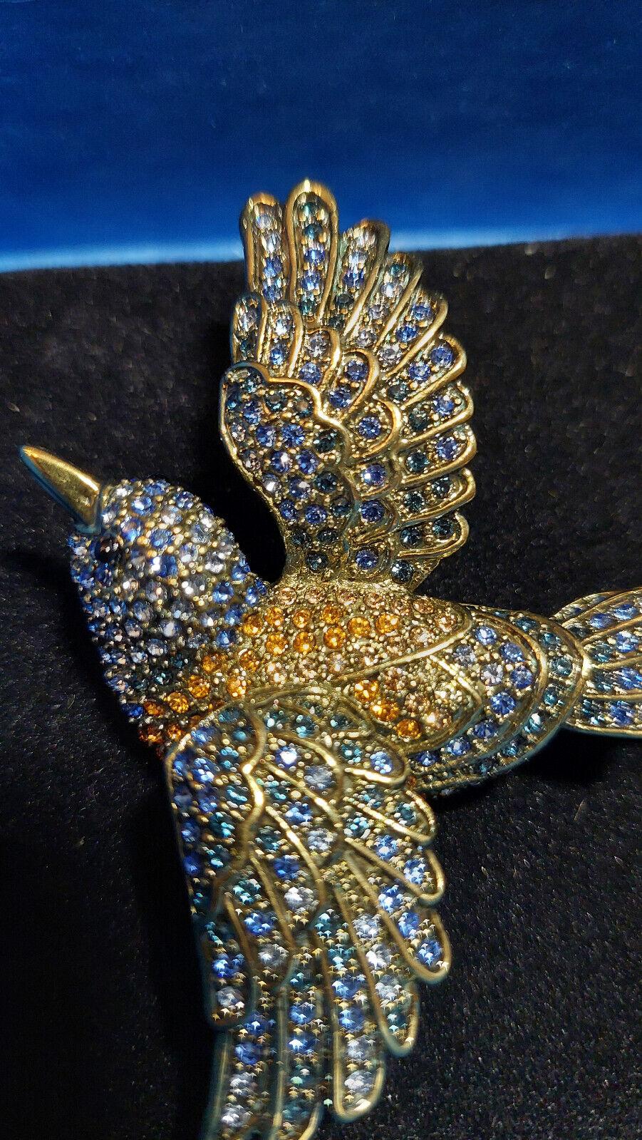 Simply Beautiful! Signed Heidi Daus Designer Graceful Swallow Bird Brooch encrusted with pave-set Sparkling Blue and Yellow Crystals. Stunning Statement Brooch. Approx. 3