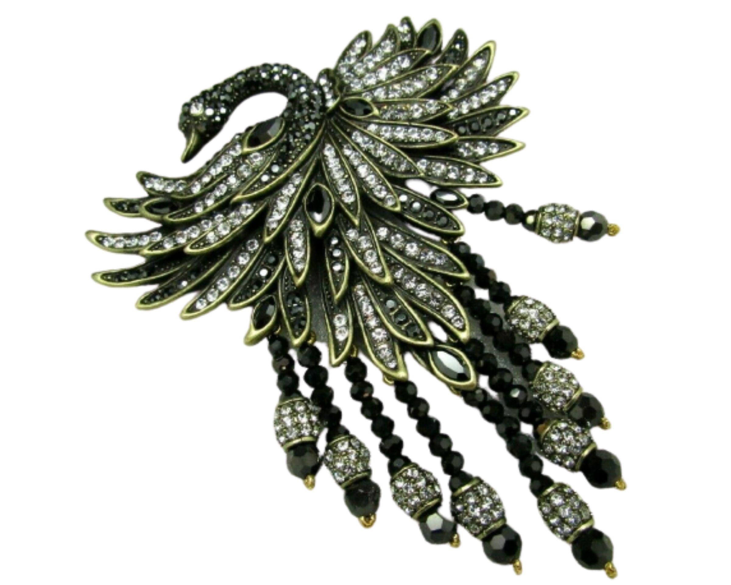 Simply Beautiful! Designer Signed Heidi Daus Show Stopper  Brooch featuring a Graceful Beauty Swan with tiered Plumage; encrusted with Sparkling Pave-set round Swarovski Crystals and enhanced at the bottom with 7 rows of graduated beaded tassel