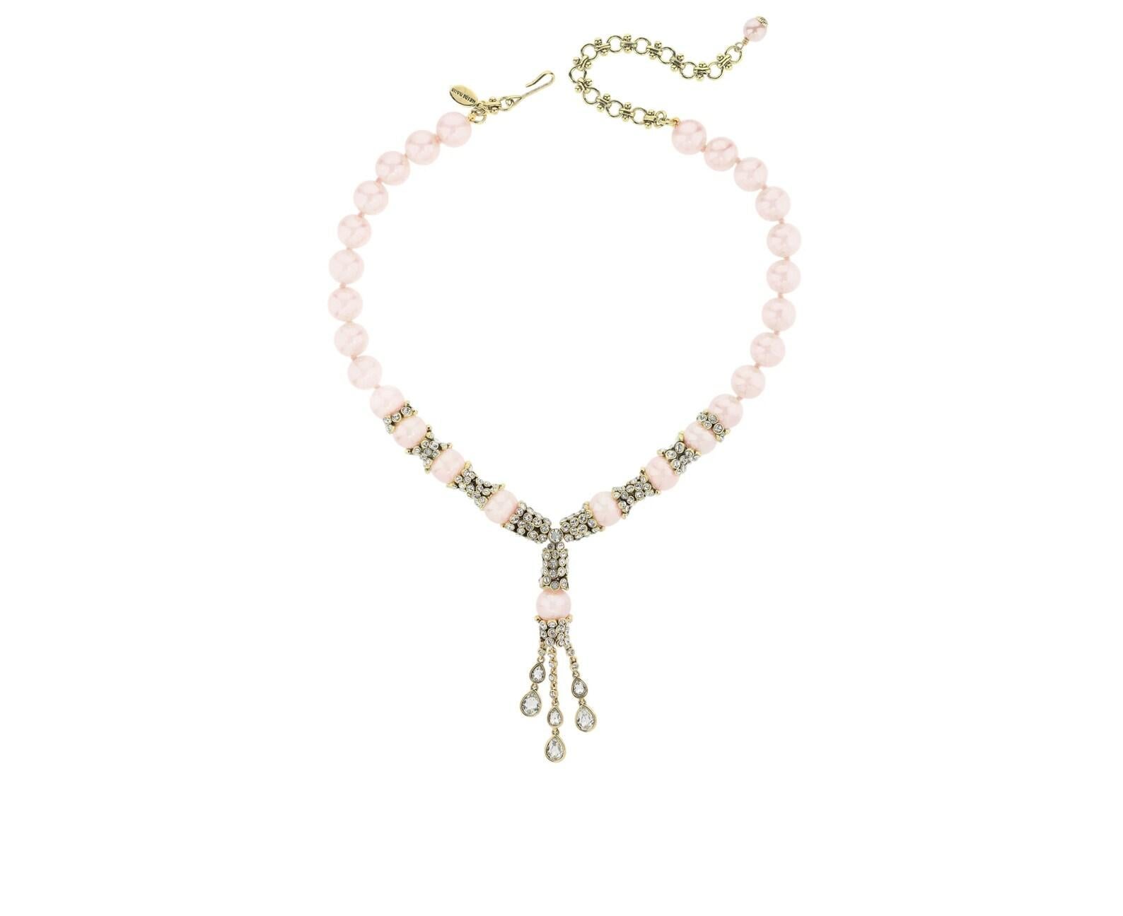Pearls and diamonds are a Heidi Girl’s best friend, and our Tear Drop Beaded Crystal Necklace Set combines both for a luxurious and classic piece that’s an instant family heirloom. A single strand of Light Pink color beads is accented by diamond