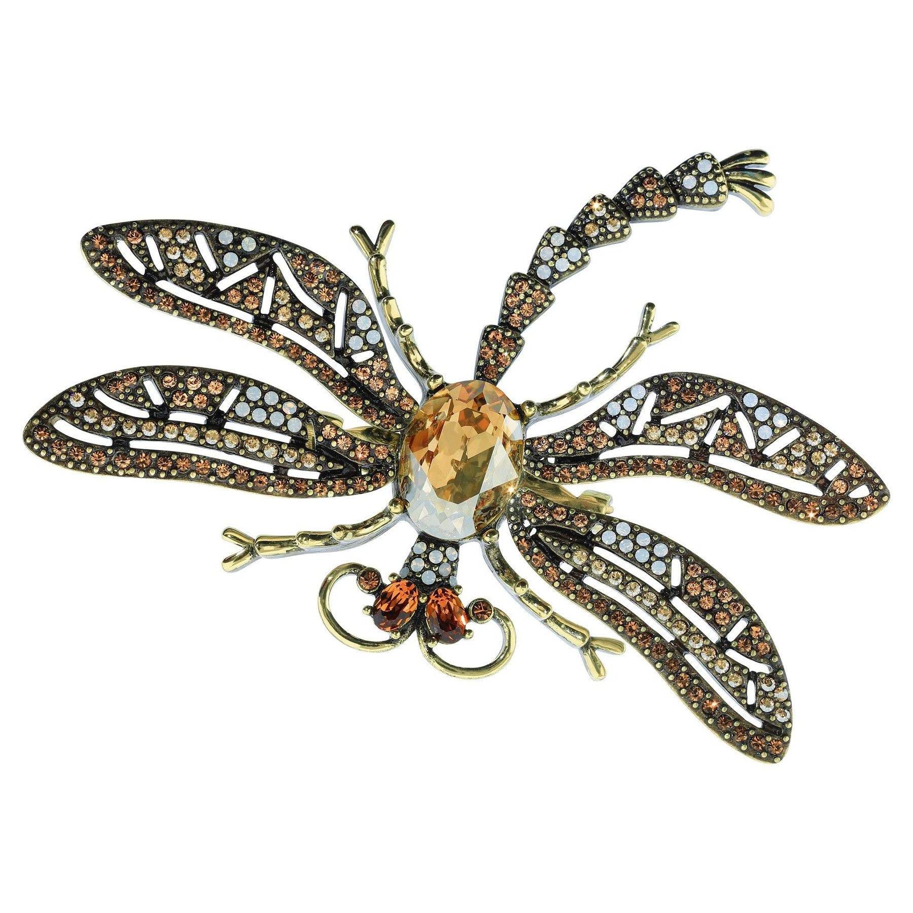 Modern Heidi Daus Trembling Brilliance Crystal Accented Dragonfly Pin Topaz Color For Sale