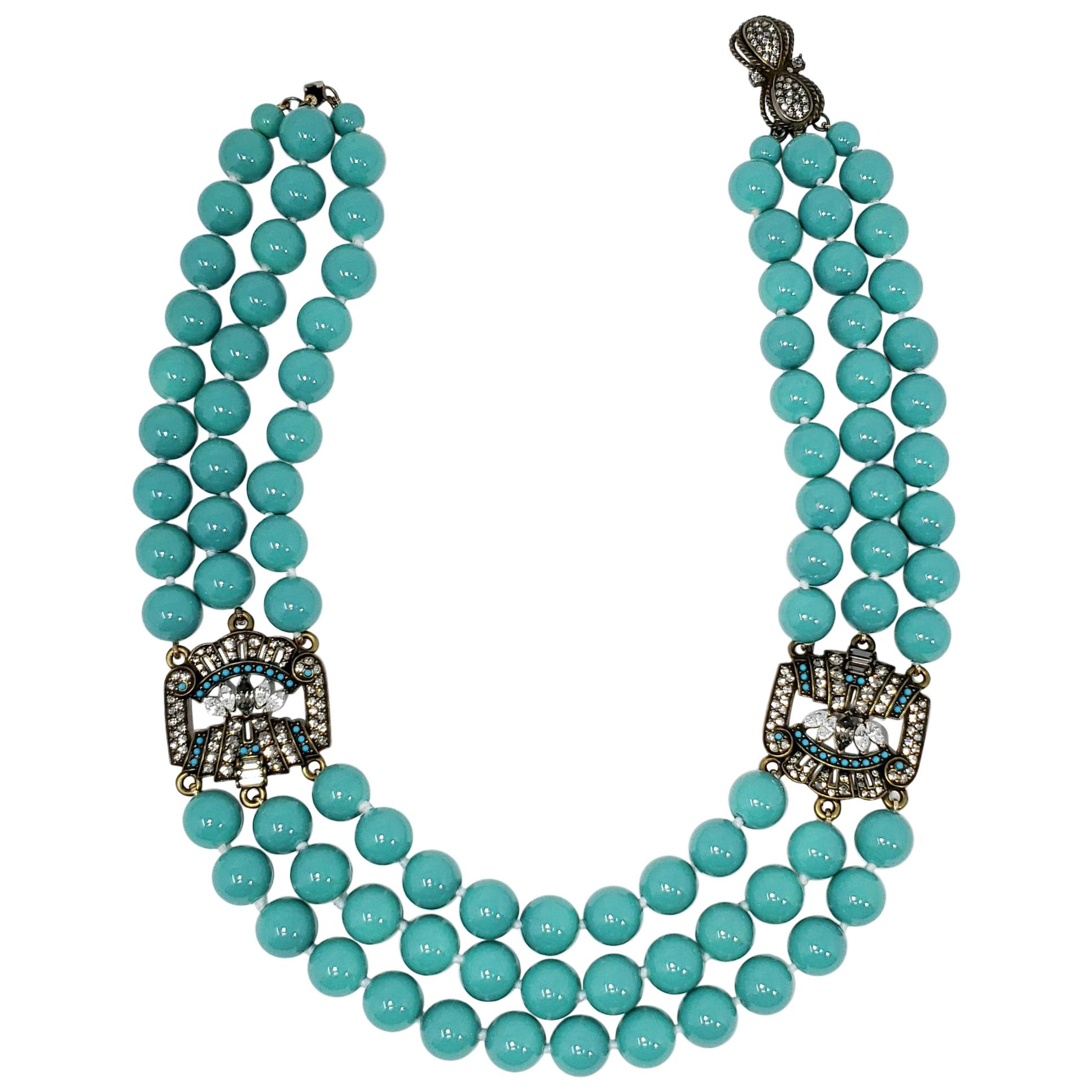 Heidi Daus Triple Strand Turquoise Bead and Crystal-Encrusted Accent Necklace For Sale