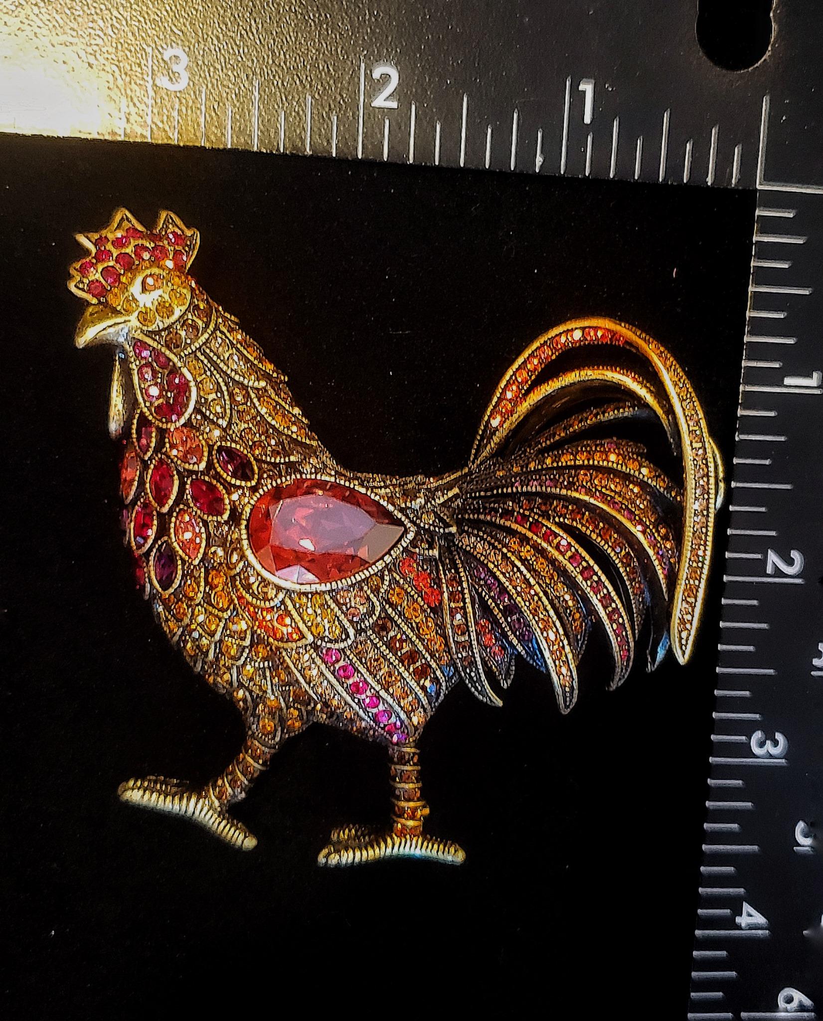 Celebrate the dawning of a new day with this sparkling rooster designed pin. This cute little creature covered in colorful crystals brings a fresh, playful scene.

Measurements:
3 3/8