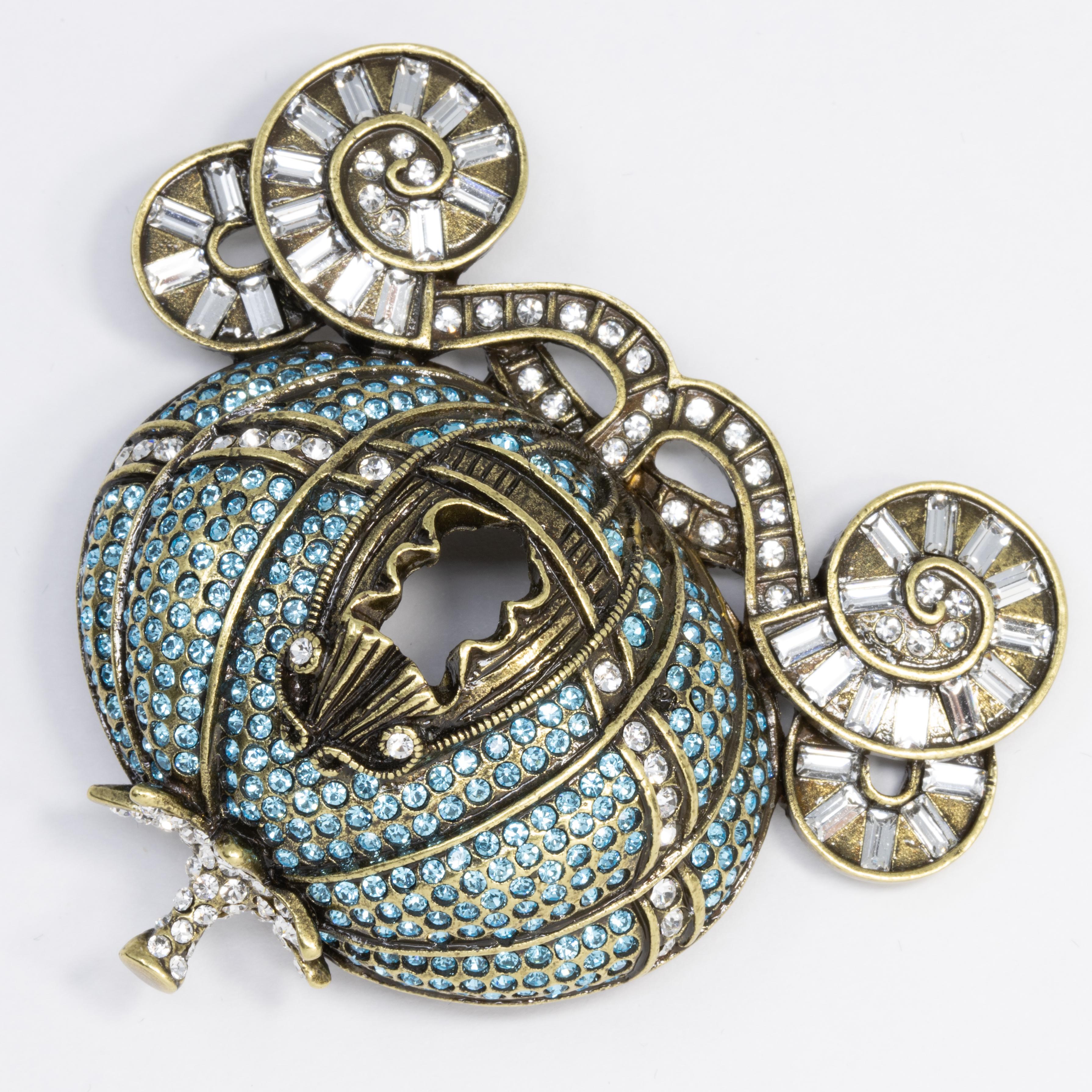 This sparkling pumpkin carriage pin is perfect for a fairy tale worthy ensemble. Cinderella inspired pin brooch from Heidi Daus.

Hallmarks: Heidi Daus, CN