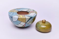 Multicolored ceramic urn by Heidi Hartmann