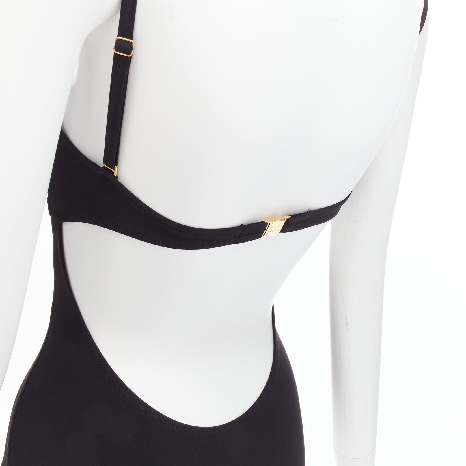 HEIDI KLEIN black gold logo clasp backless flutter bust one piece swimsuit US0 XS
Reference: SNKO/A00366
Brand: Heidi Klein
Material: Polyamide, Elastane
Color: Black
Pattern: Solid
Closure: Clasp
Lining: Black Fabric
Extra Details: Backless. Gold