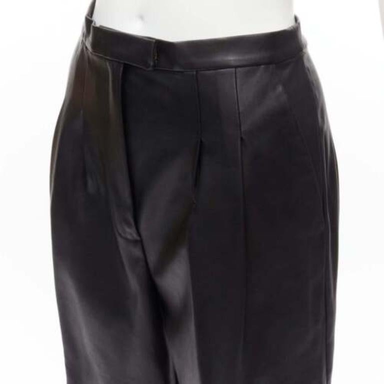 HEIDI MERRICK pantalones culotte de cuero negro con pliegues delanteros y cintura alta US2 S
Referencia: LNKO/A02218
Marca Heidi Merrick
Material: Piel
Color: Negro
Patrón: Sólido
Cierre: Bragueta con cremallera
Detalles adicionales: Espalda