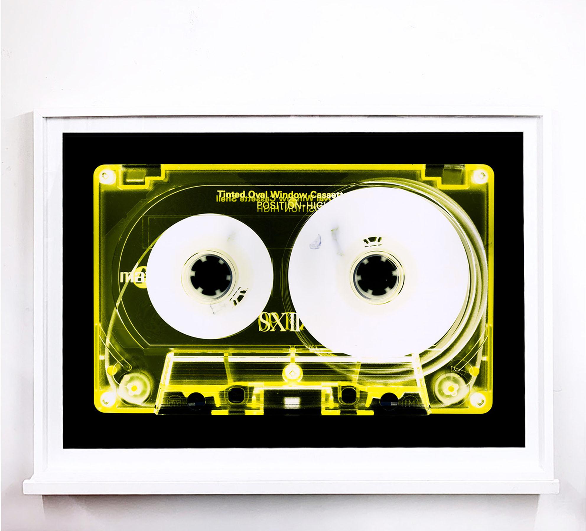 Tape Collection, Yellow Tinted Cassette - Contemporary Pop Art Color Photography - Black Still-Life Photograph by Heidler & Heeps