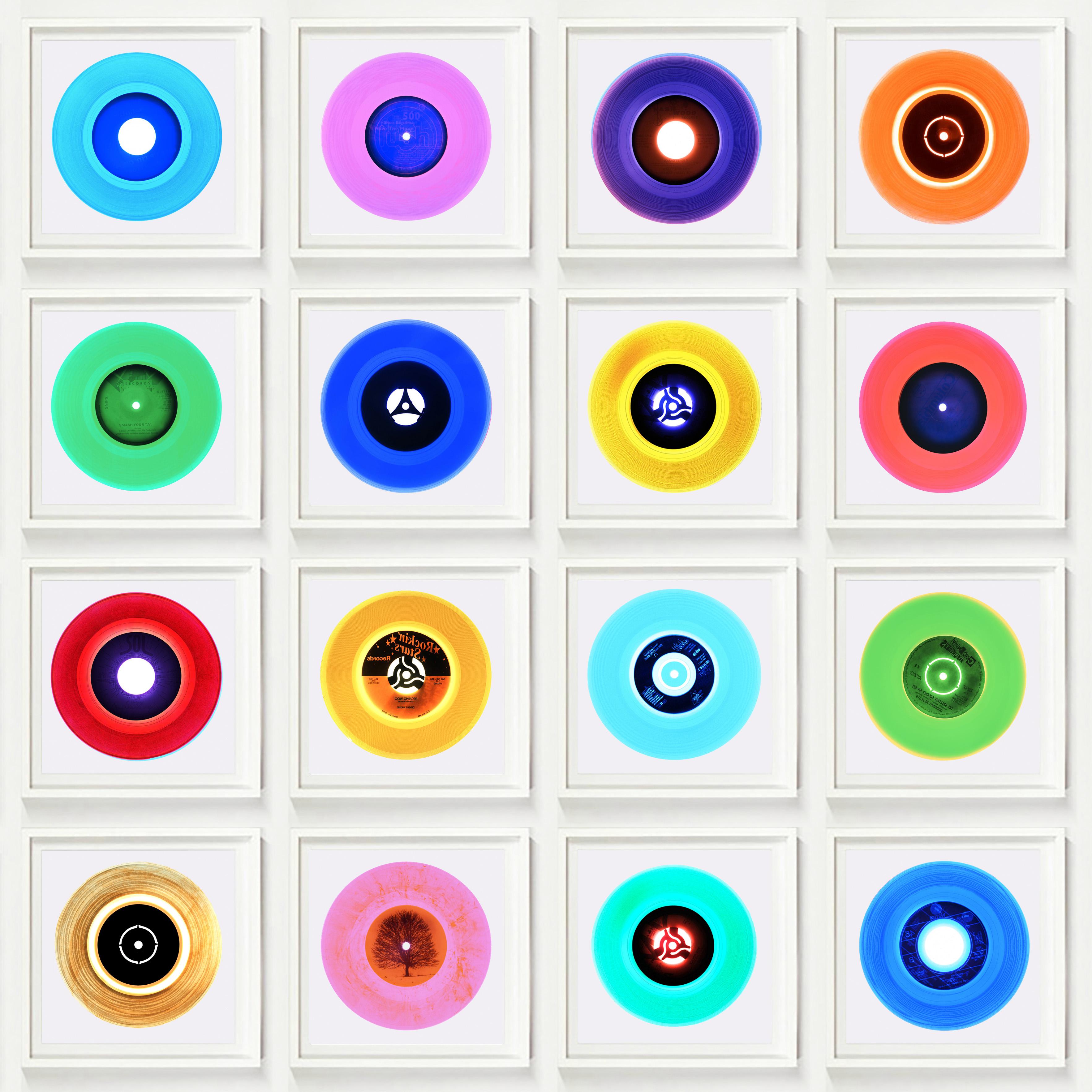 Heidler & Heeps B Side Vinyl Collection Sixteen Piece Multicolor Square Installation.
Acclaimed contemporary photographers, Richard Heeps and Natasha Heidler have collaborated to make this beautifully mesmerising collection. A celebration of the